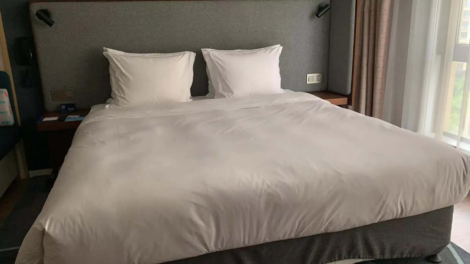 Bed in Holiday Inn Express Zhangjiagang East by IHG Bed in Holiday Inn Express Zhangjiagang East by IHG