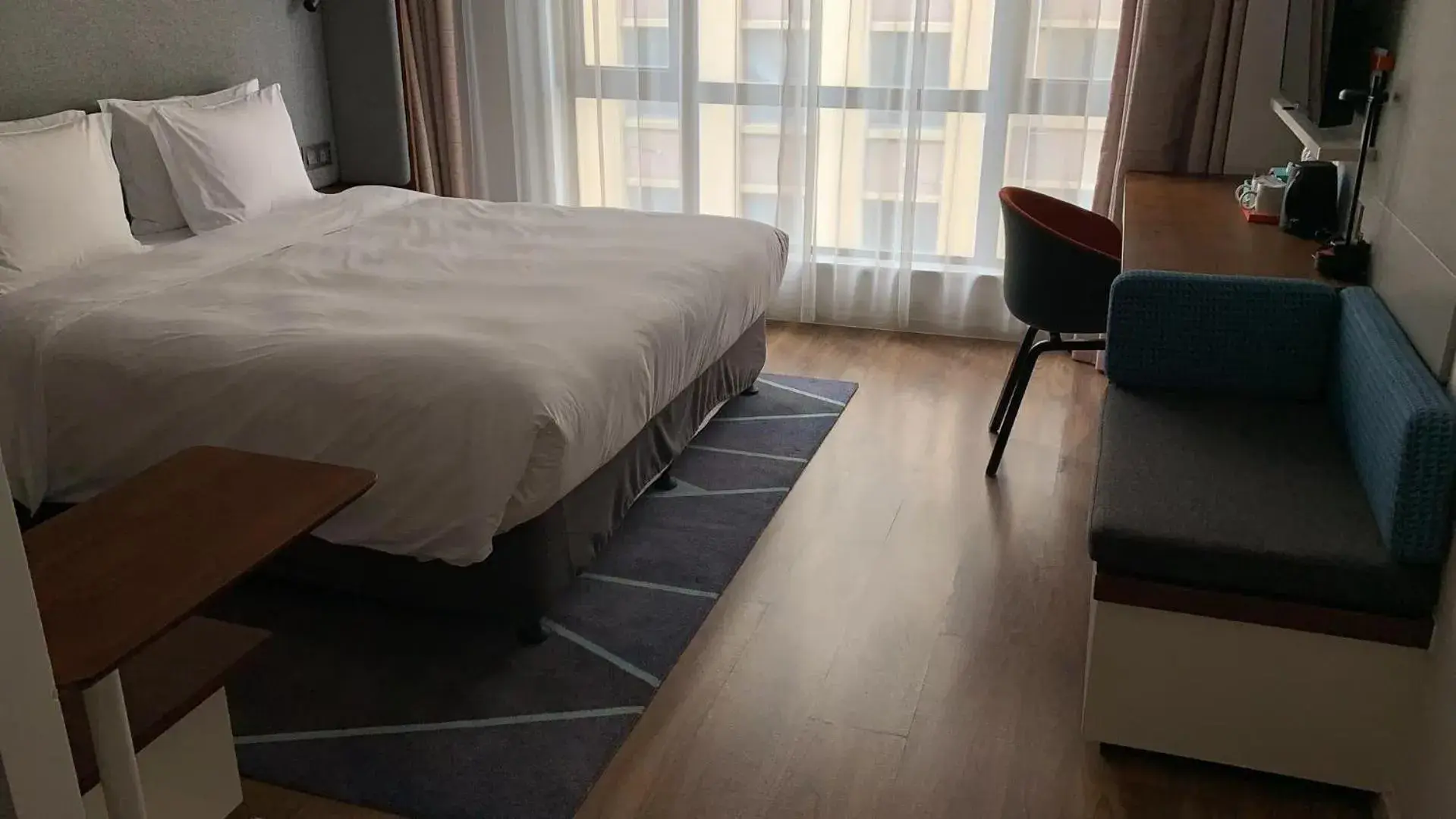 Bed in Holiday Inn Express Zhangjiagang East by IHG Bed in Holiday Inn Express Zhangjiagang East by IHG