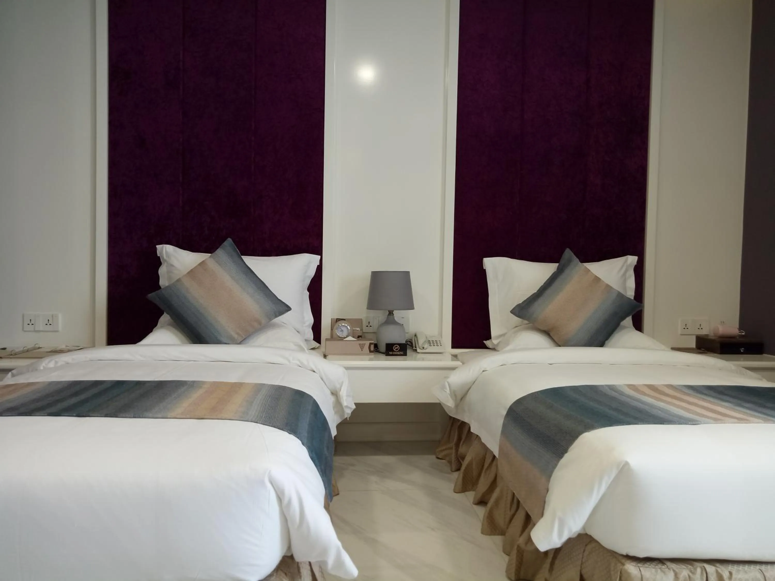 Bed in V Boutique Hotel