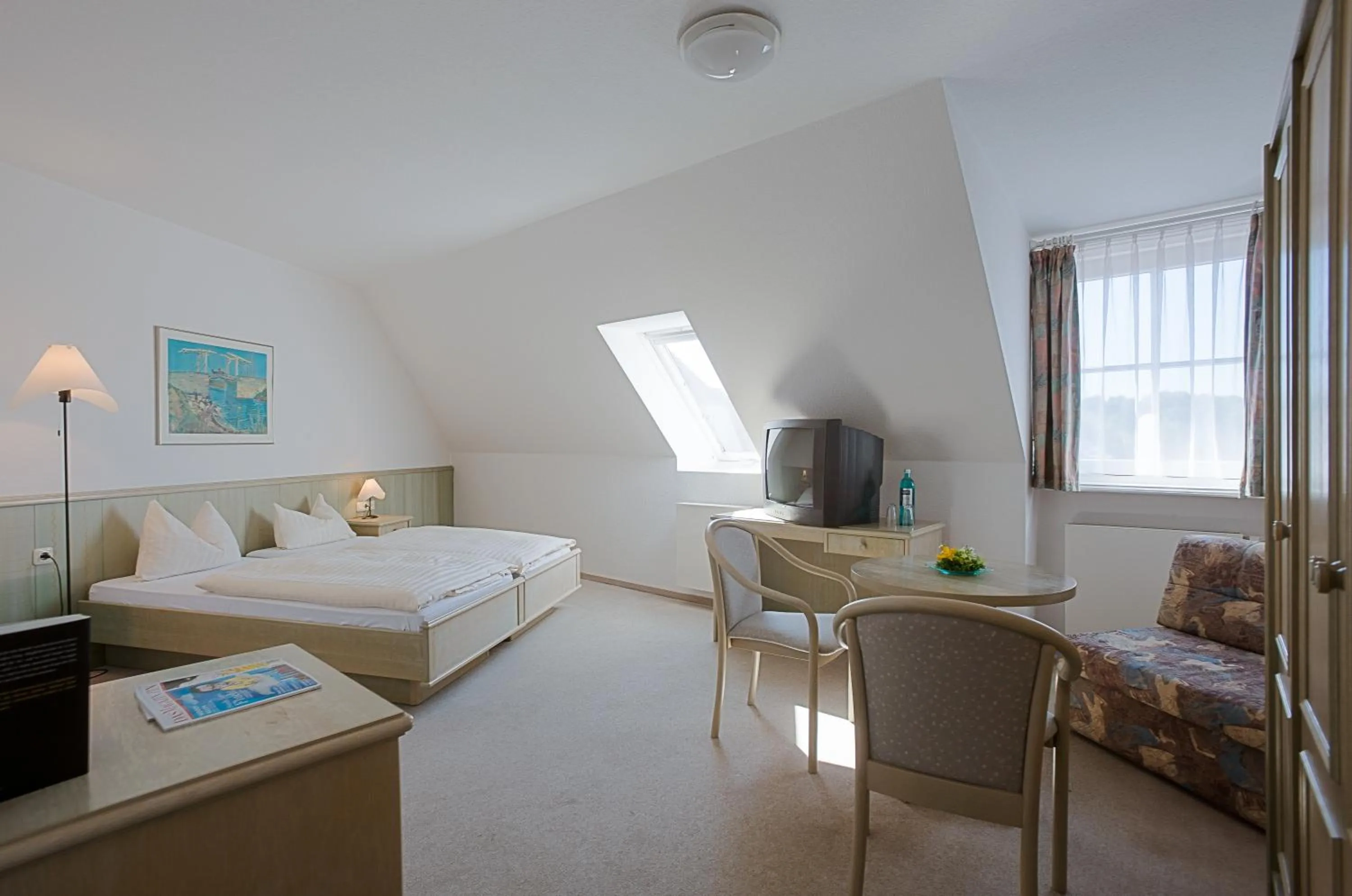 Photo of the whole room, Bed in Der Insulaner - Hotel & Restaurant