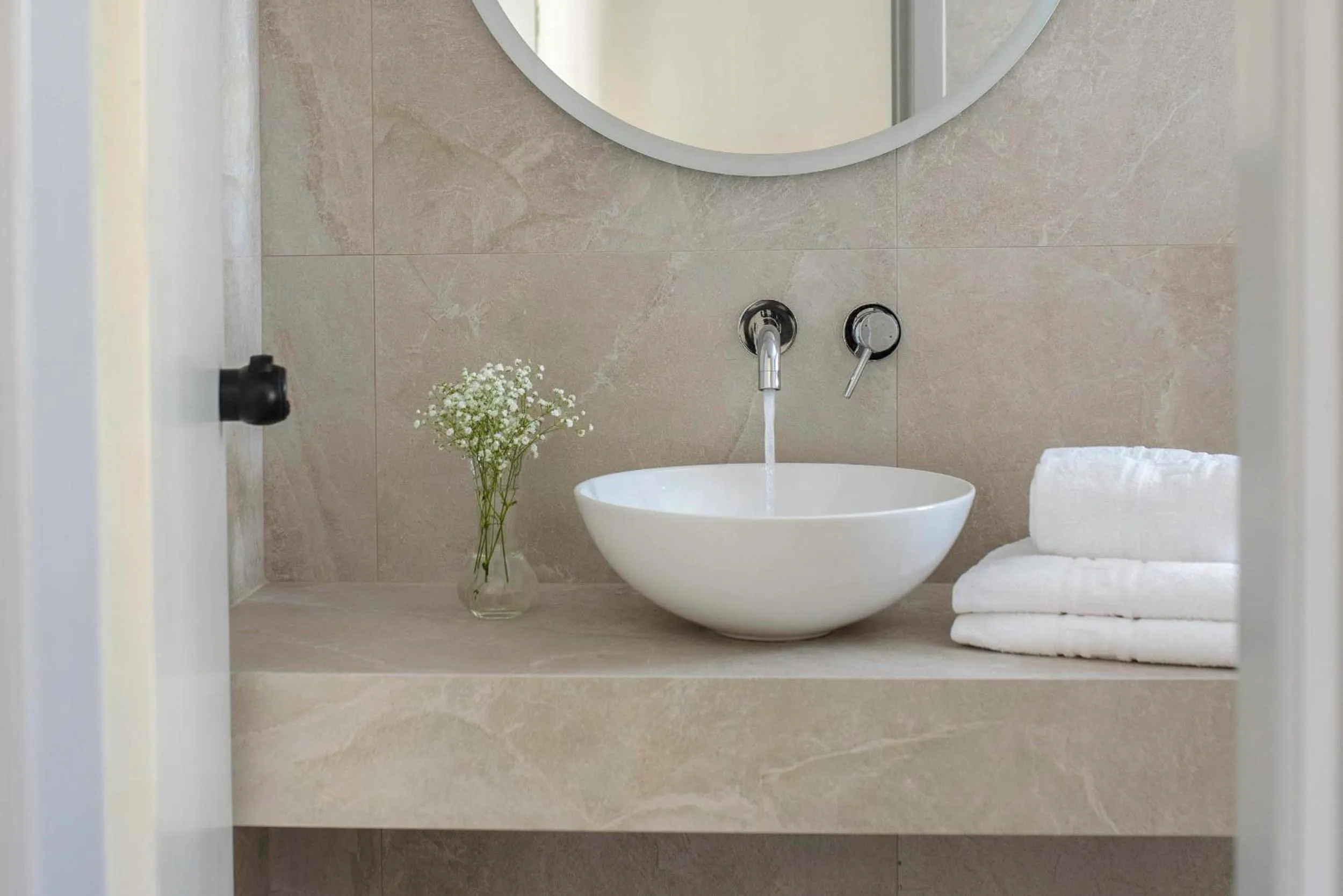 Bathroom in Diamond Apartments & Suites