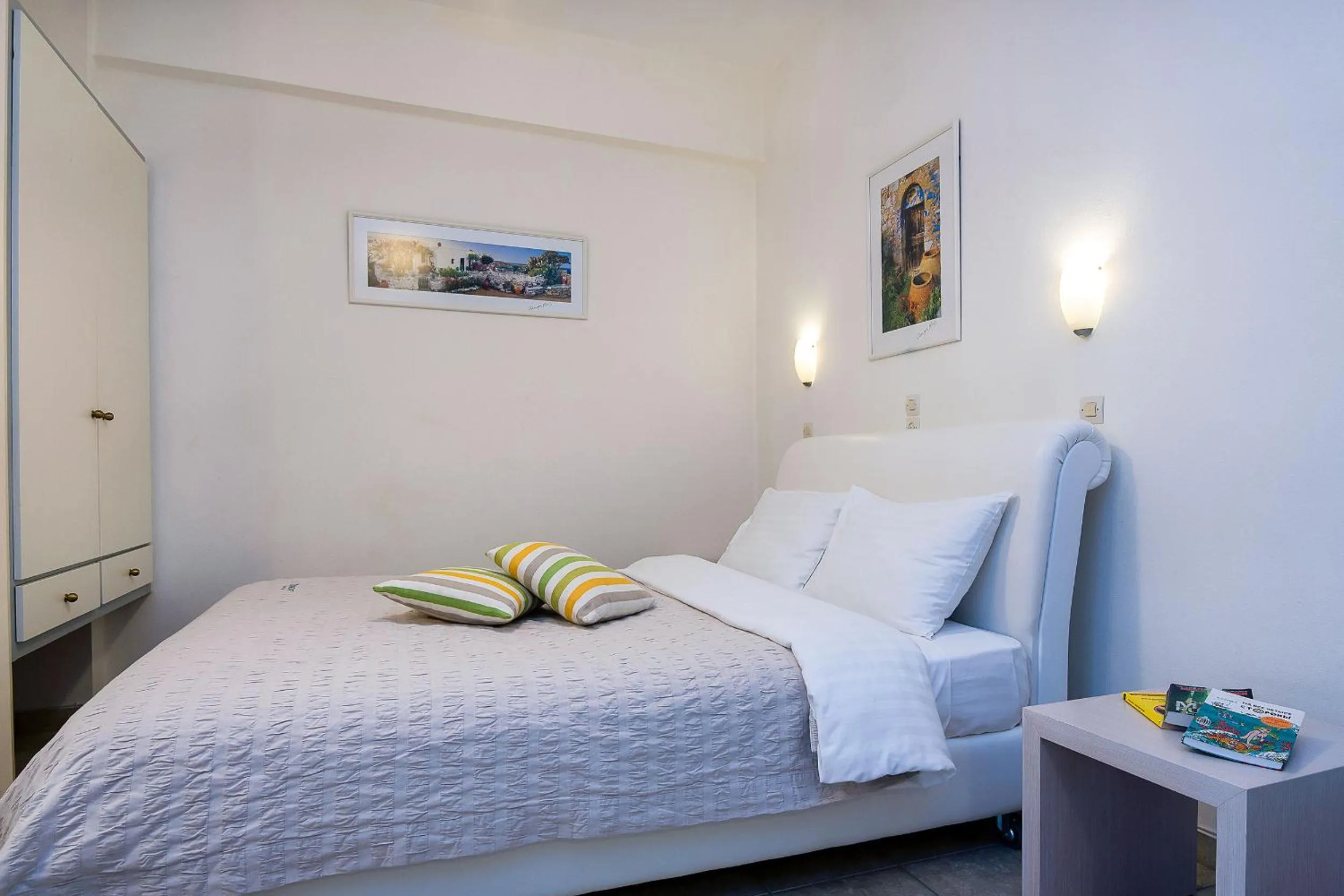 Bedroom, Bed in Diamond Apartments & Suites