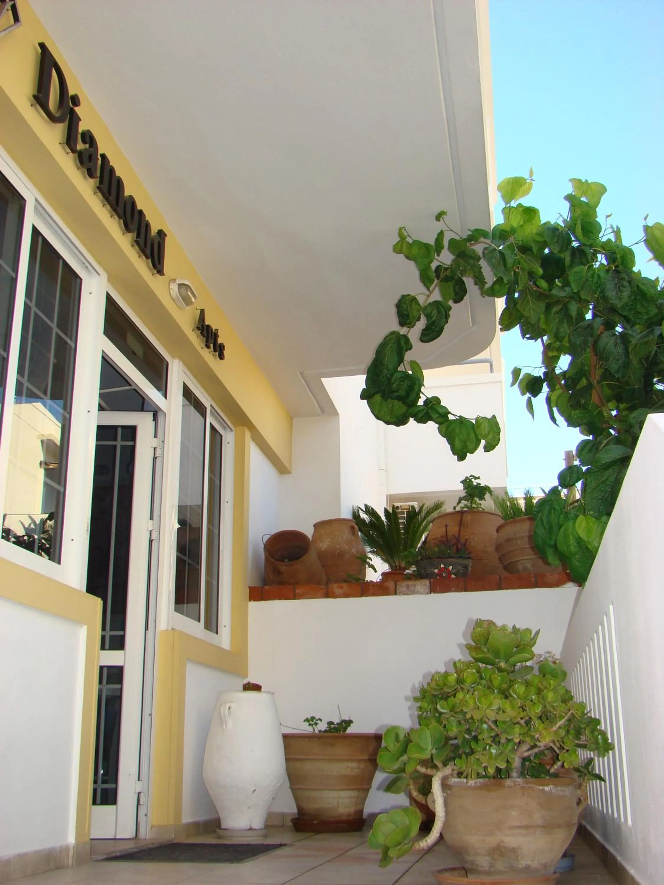 Facade/entrance in Diamond Apartments & Suites