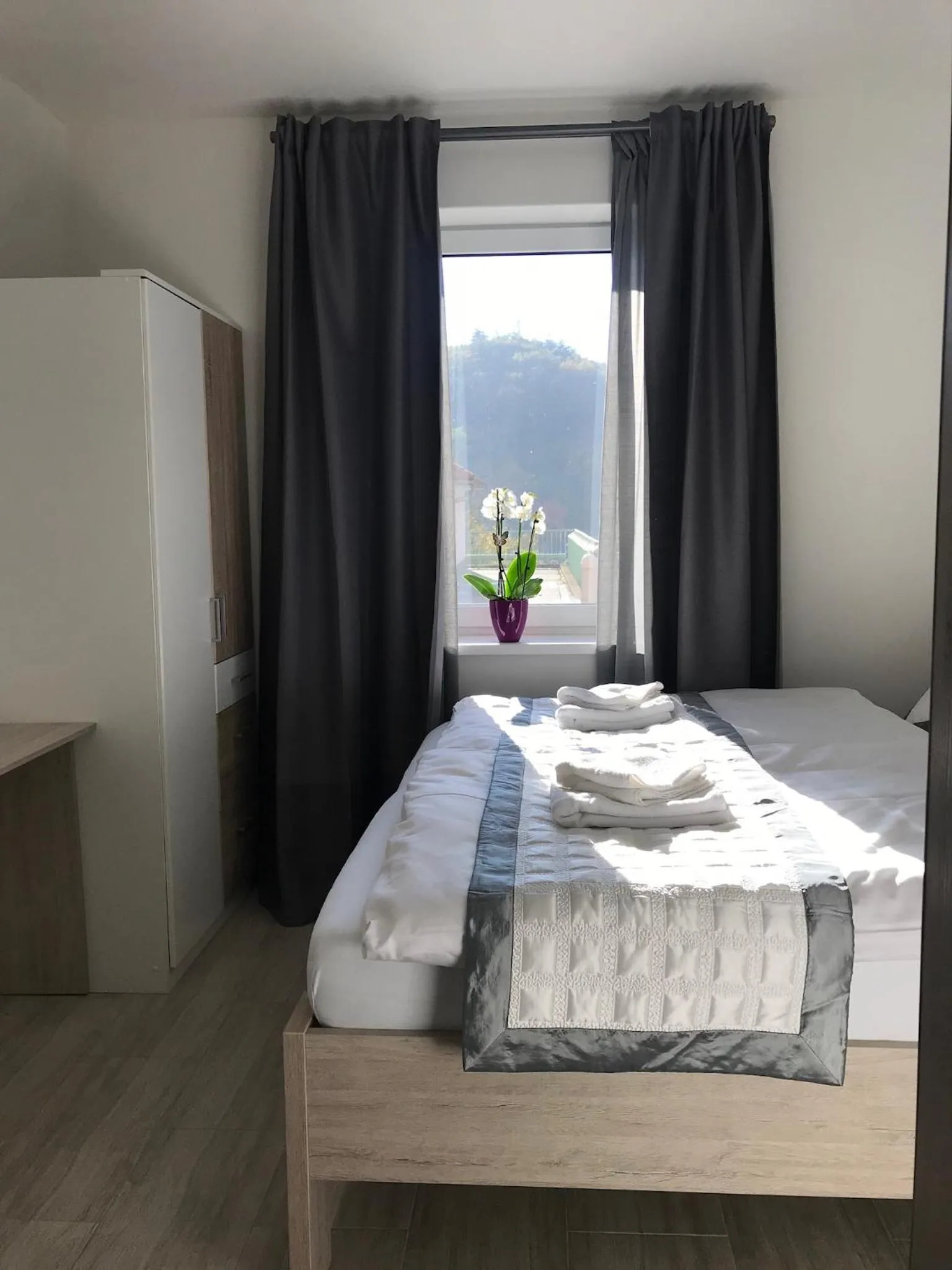 Bed in Panorama Apartments