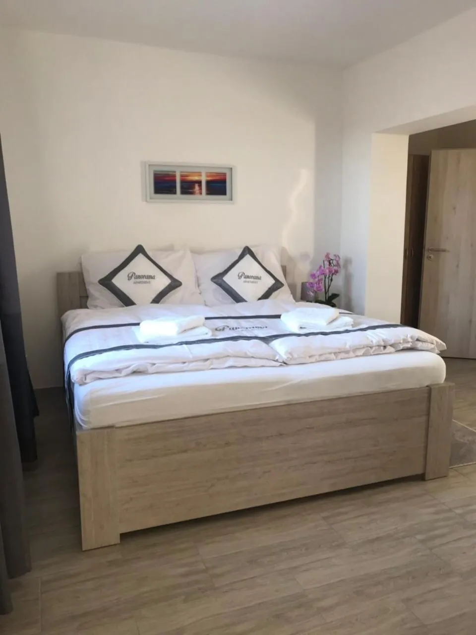 Bed in Panorama Apartments