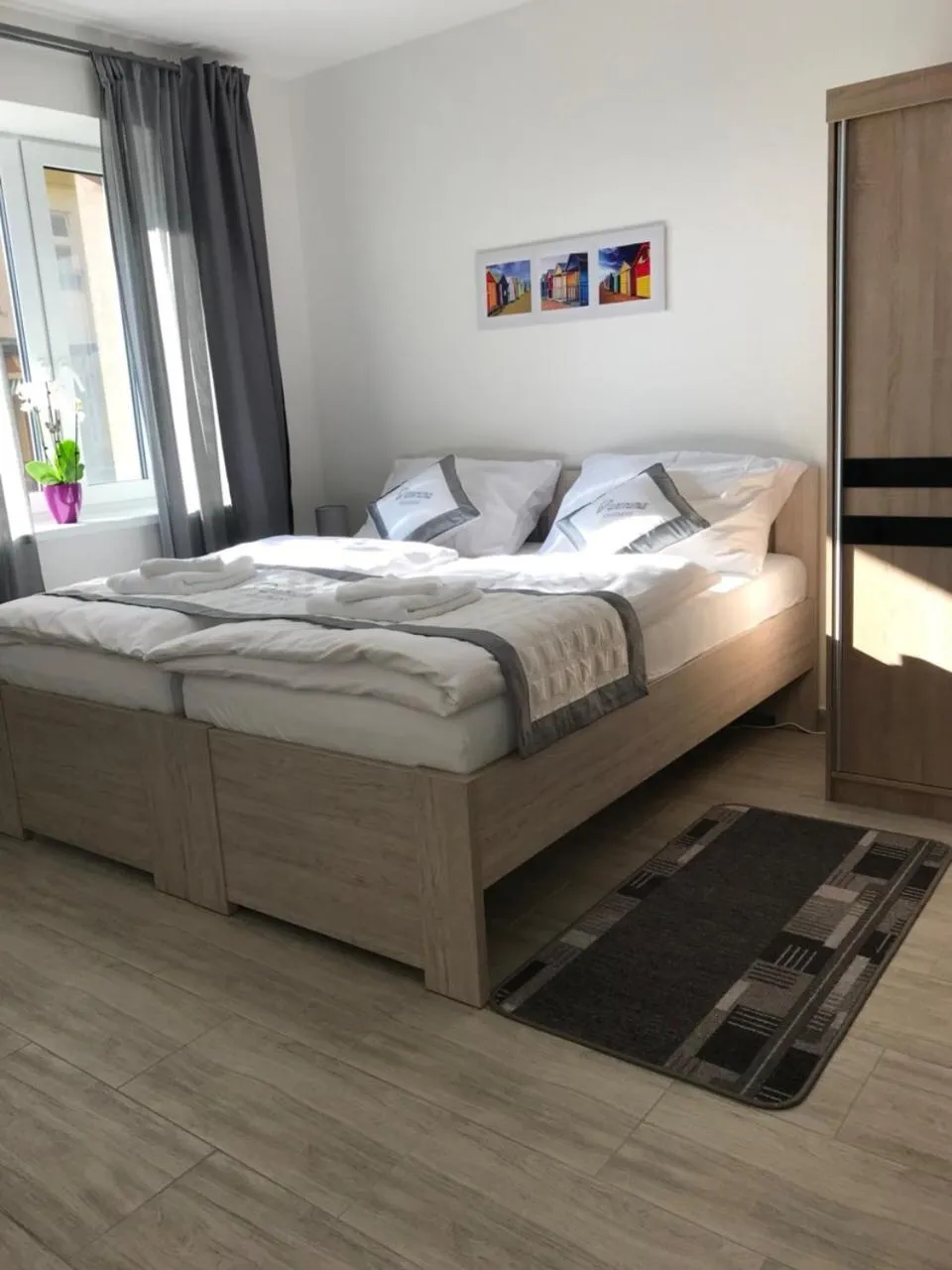 Bed in Panorama Apartments