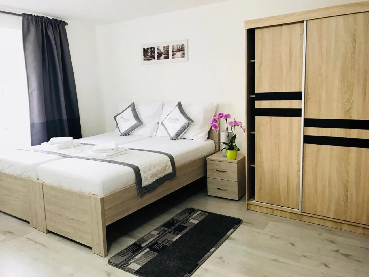 Bed in Panorama Apartments