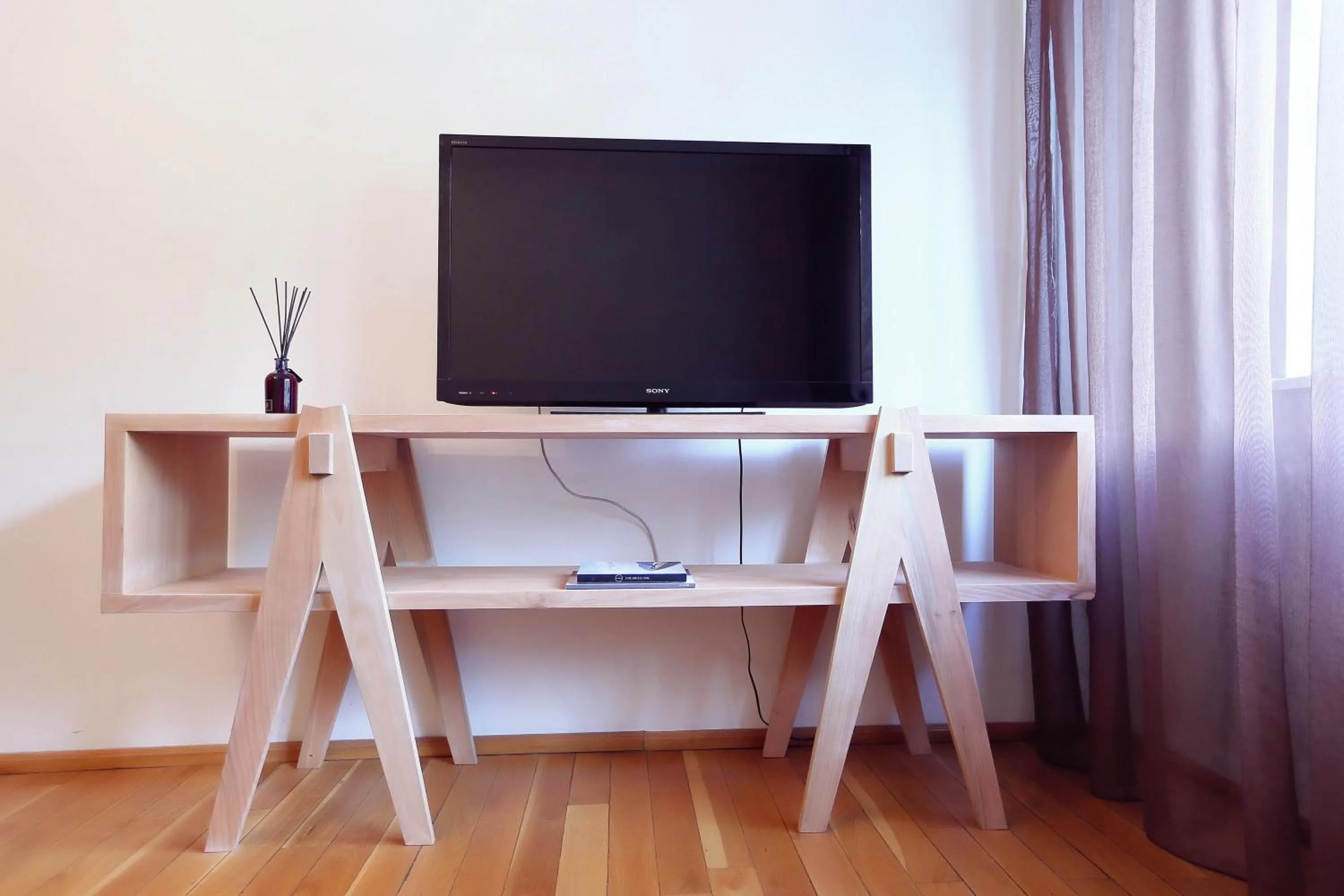 Communal lounge/ TV room in Living In Aparthotel