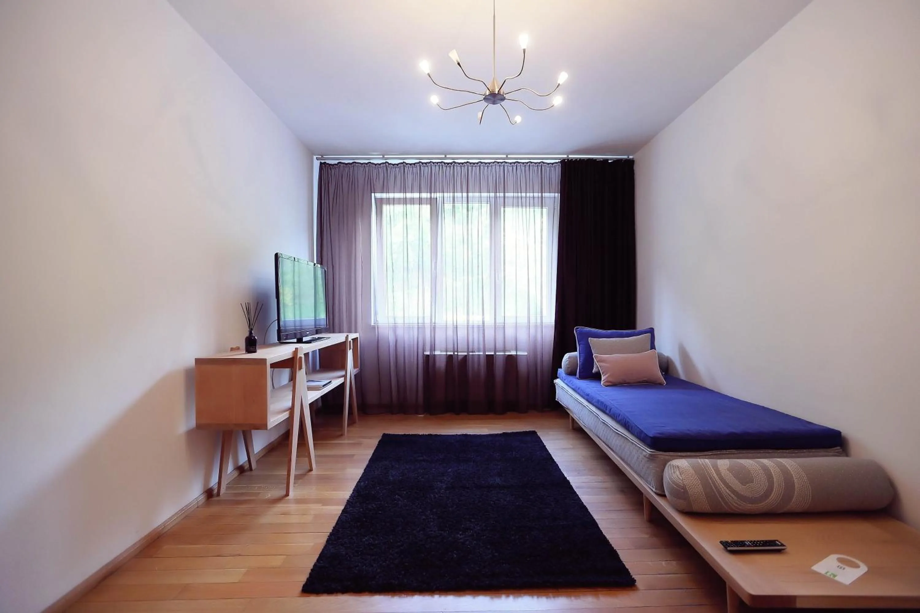 Photo of the whole room, Bed in Living In Aparthotel