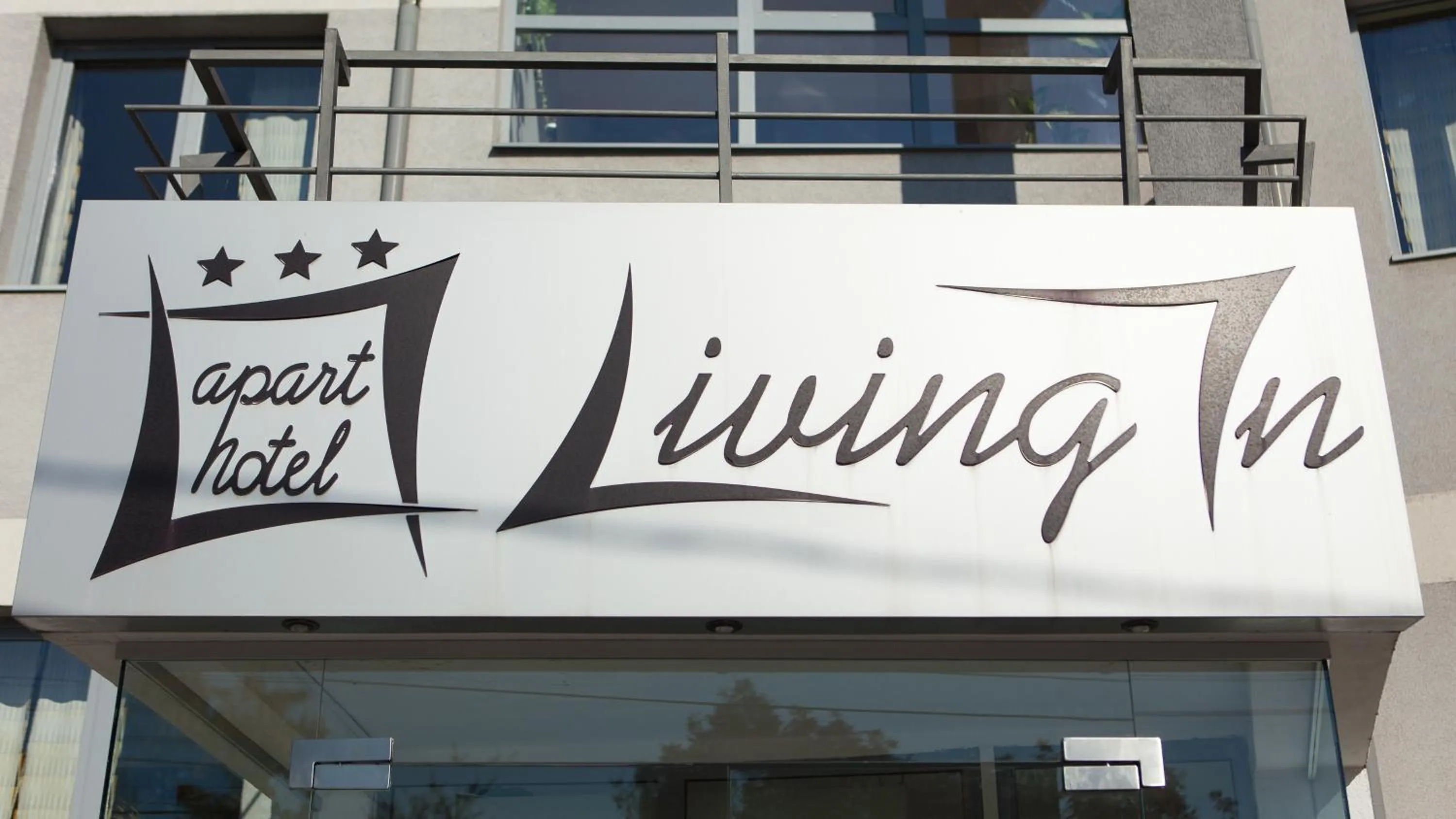 Property logo or sign in Living In Aparthotel