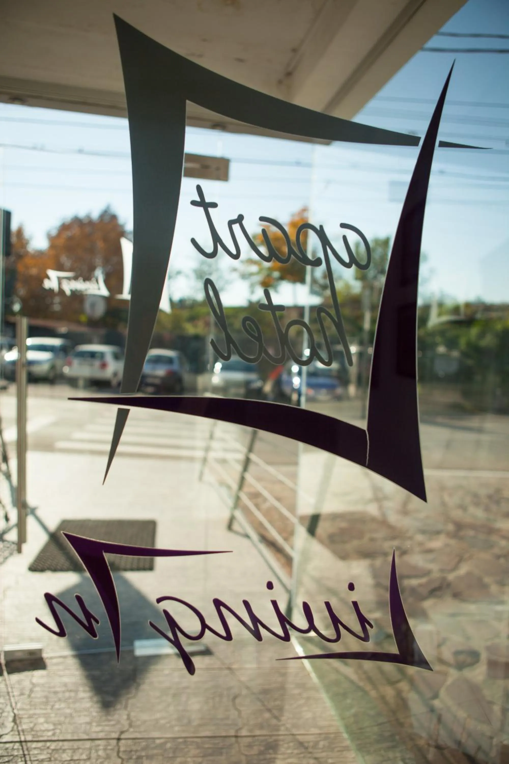 Property logo or sign in Living In Aparthotel