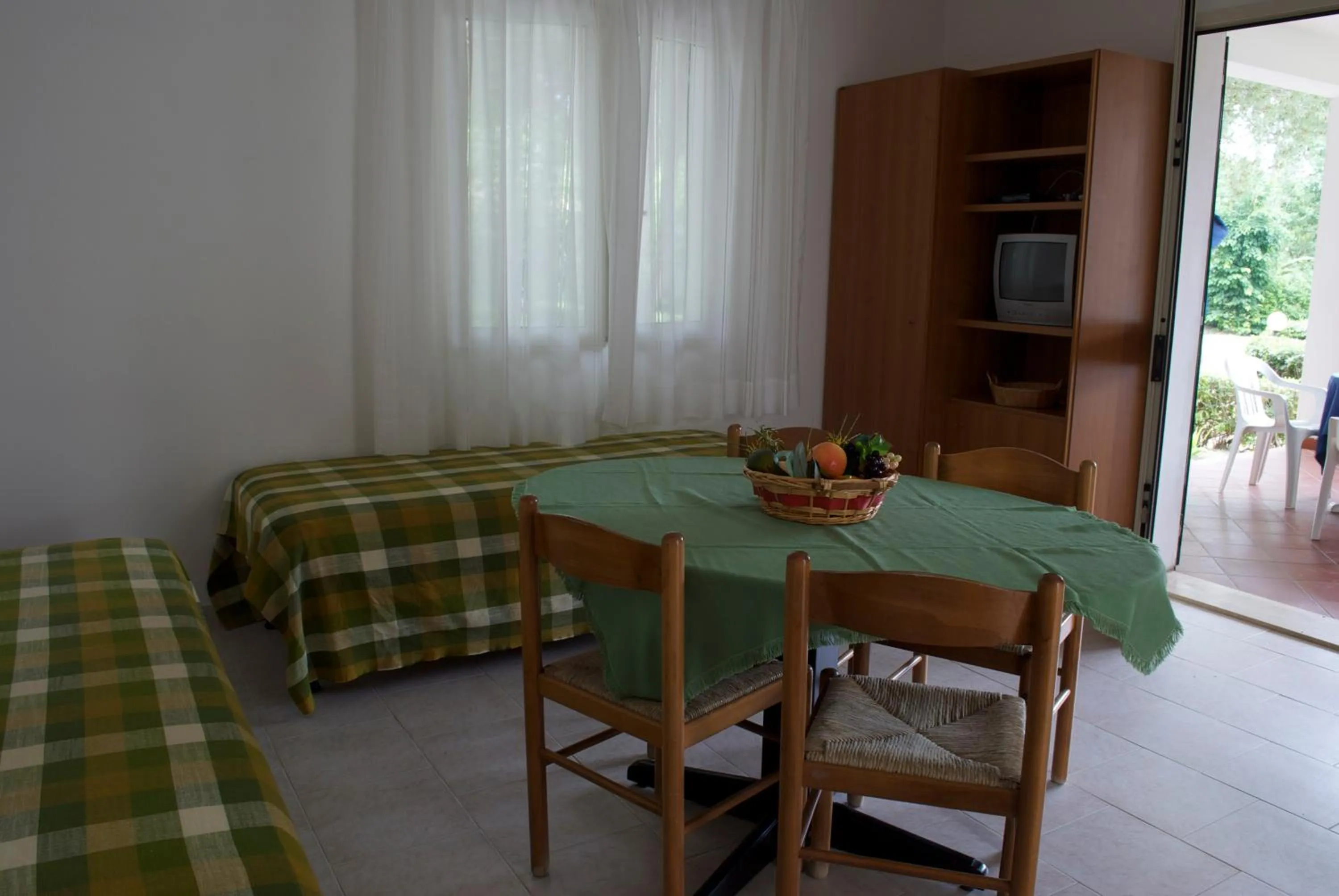 Living room, Bed in Residence Hotel Baia del Sole