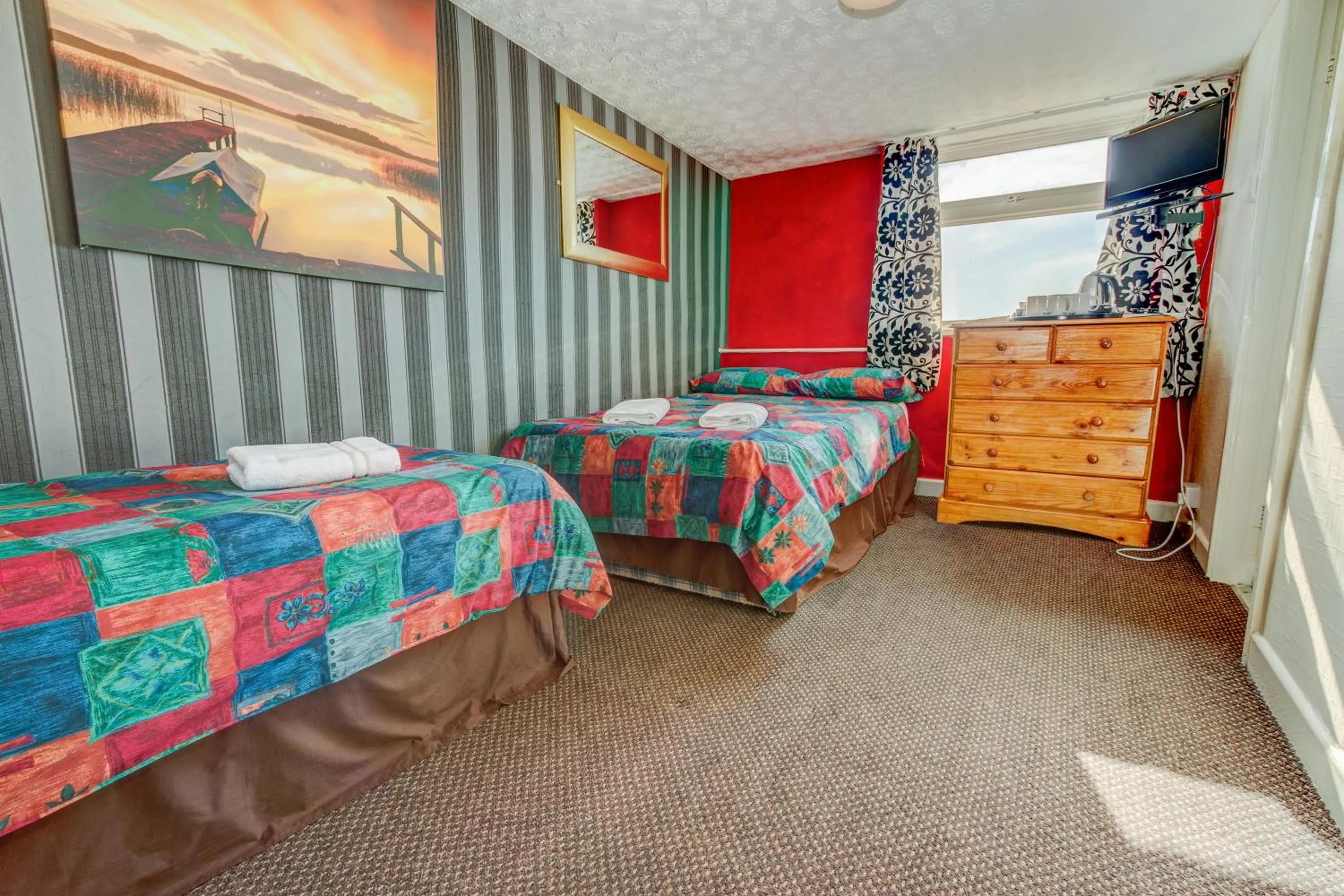 Bed in New Promenade Hotel