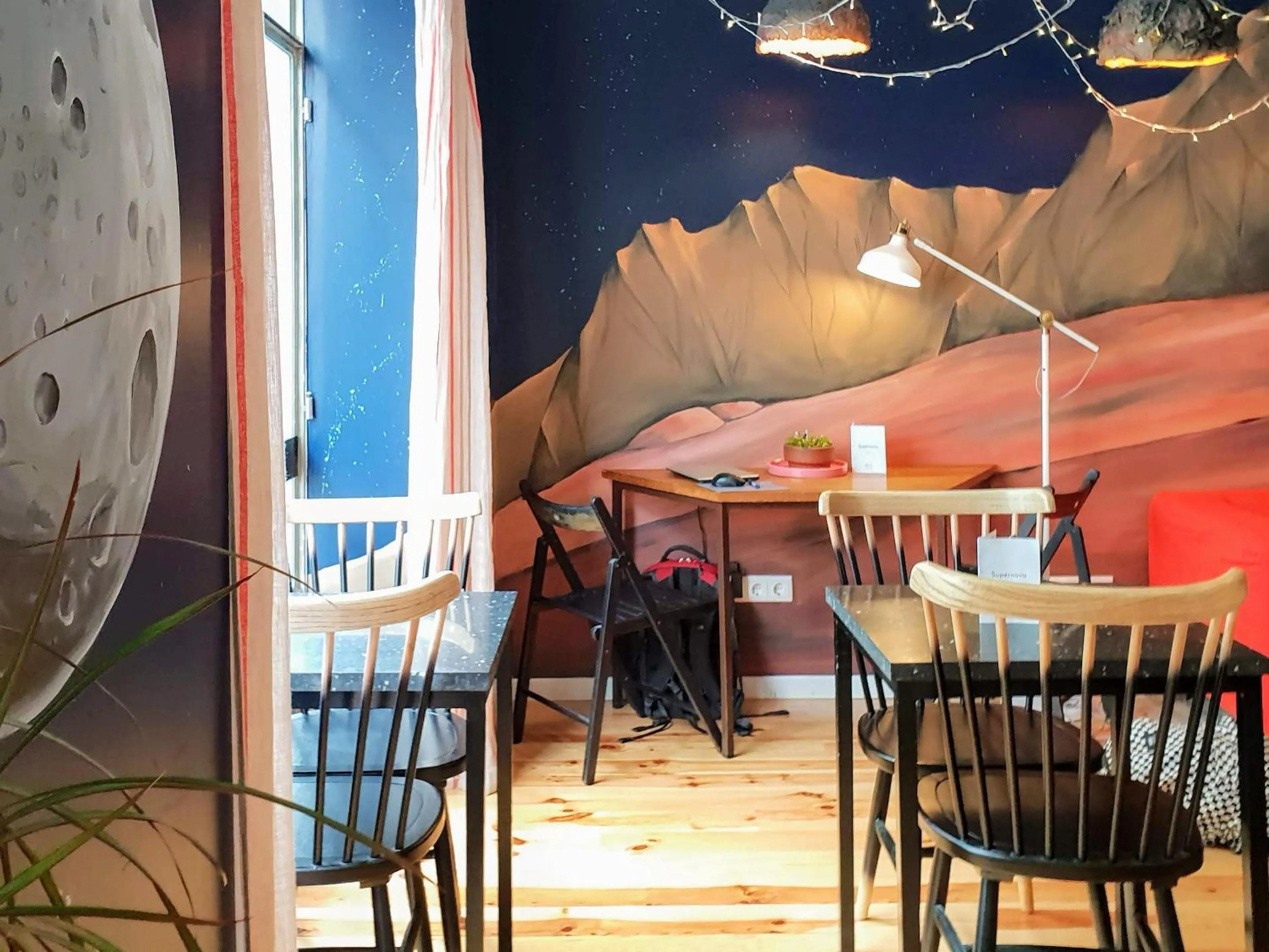 Communal lounge/ TV room in SUPERNOVA Hostel