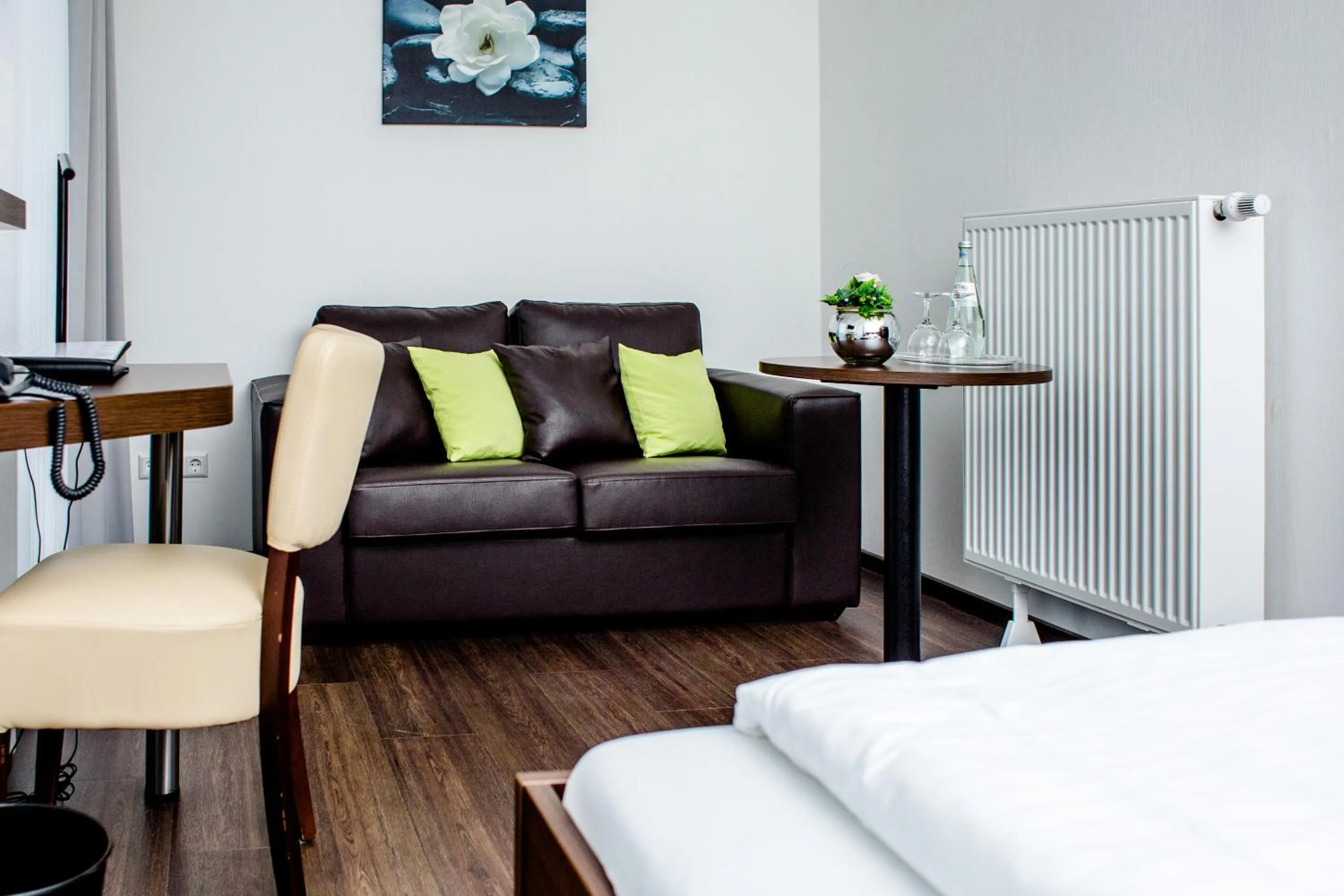 Seating area, Bed in Hotel Bolte