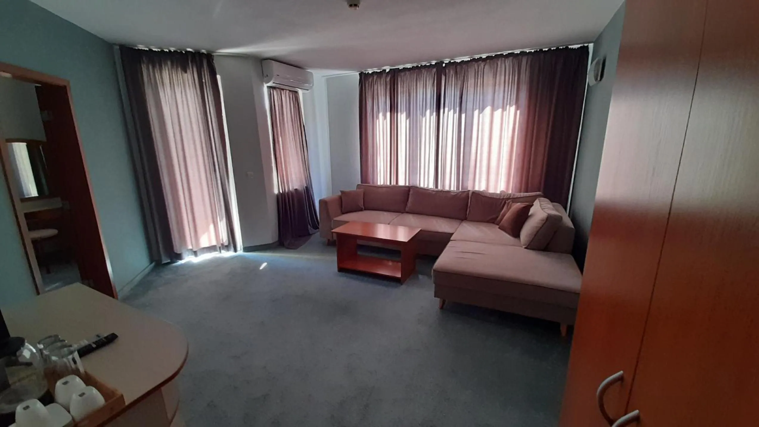 Living room, Bed in Family Hotel Saga