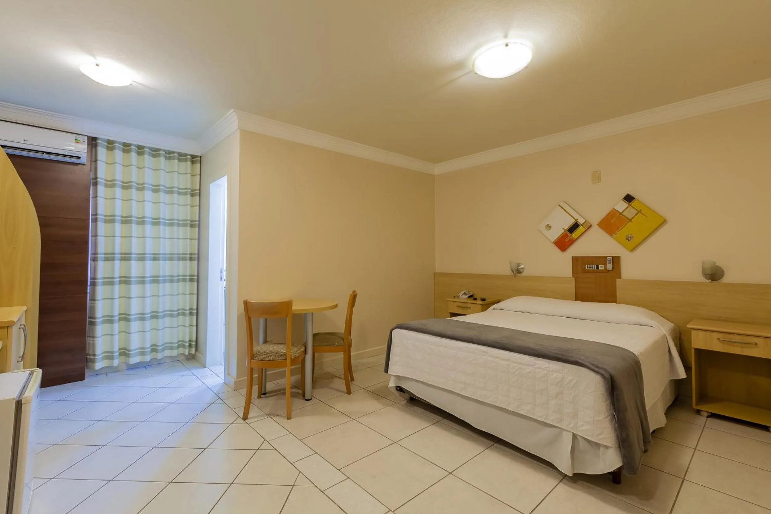 Bedroom, Bed in Tri Hotel Executive Criciúma