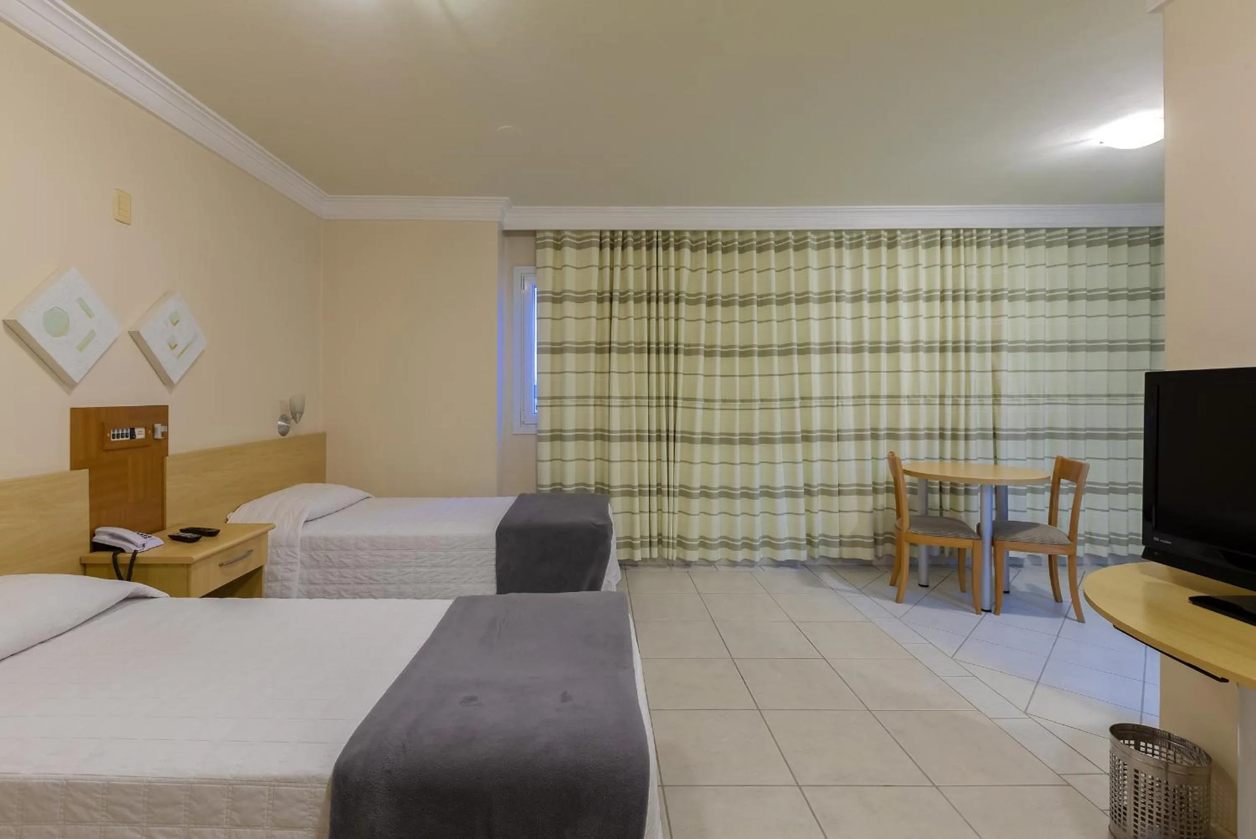 Bedroom, Bed in Tri Hotel Executive Criciúma