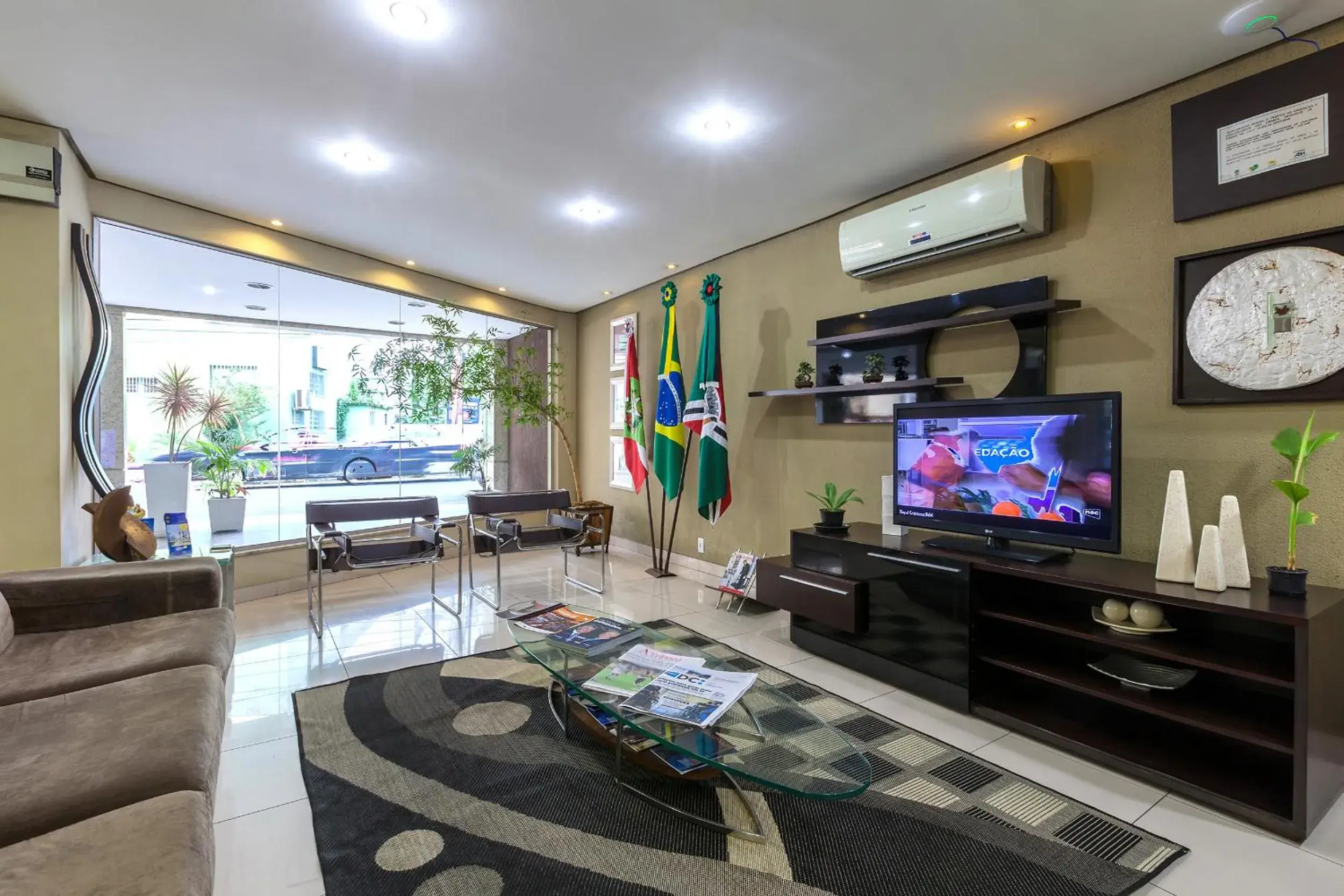 Lobby or reception in Tri Hotel Criciúma Lobby or reception in Tri Hotel Criciúma