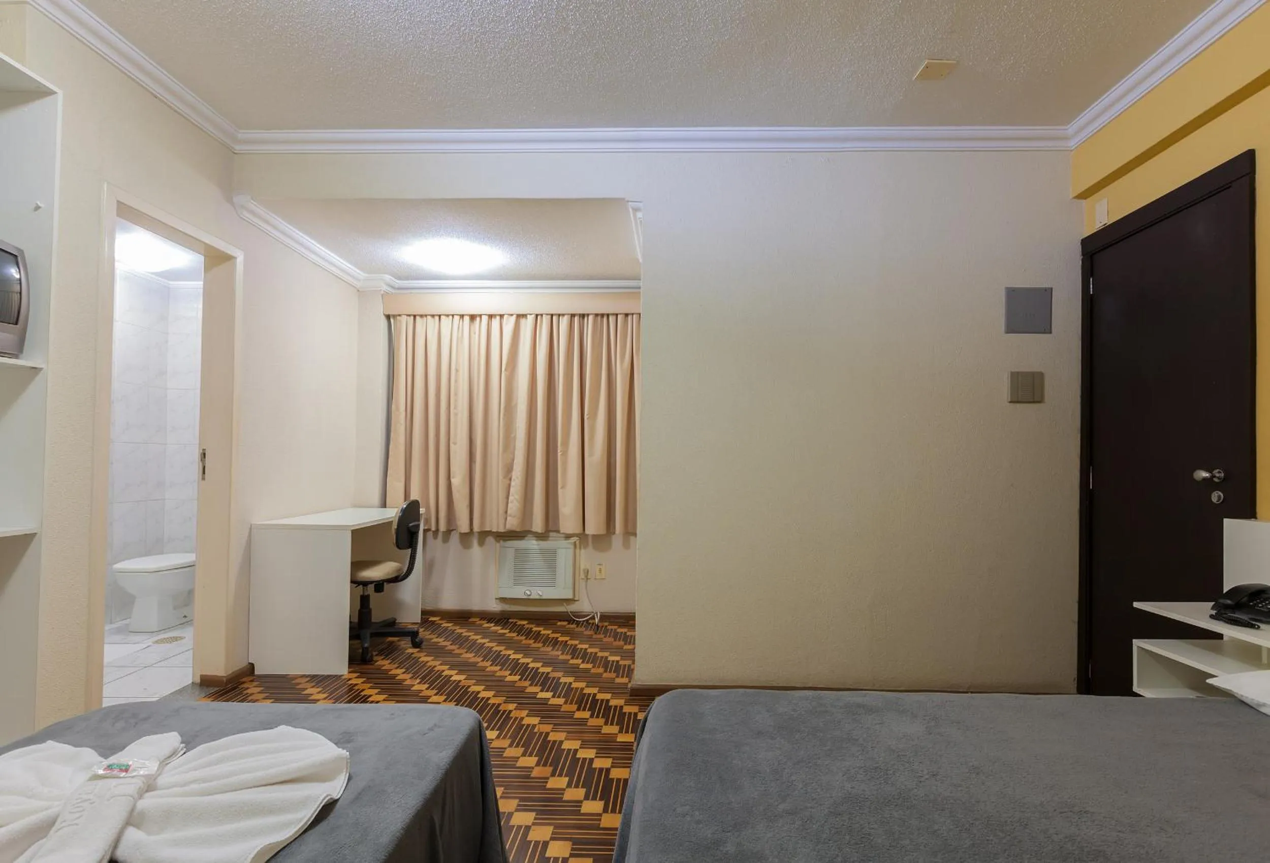 Bedroom, Bed in Tri Hotel Criciúma