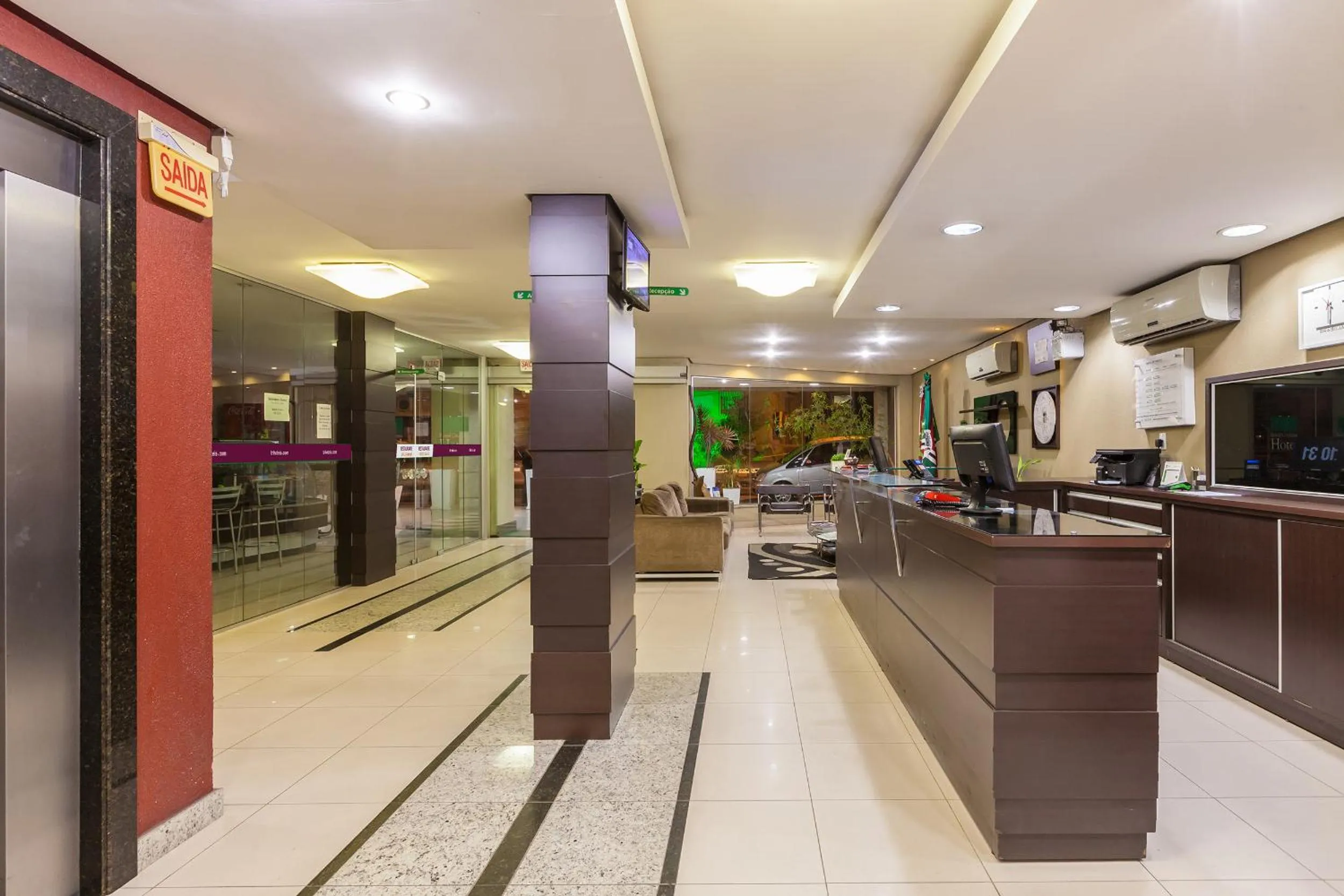 Lobby or reception in Tri Hotel Criciúma