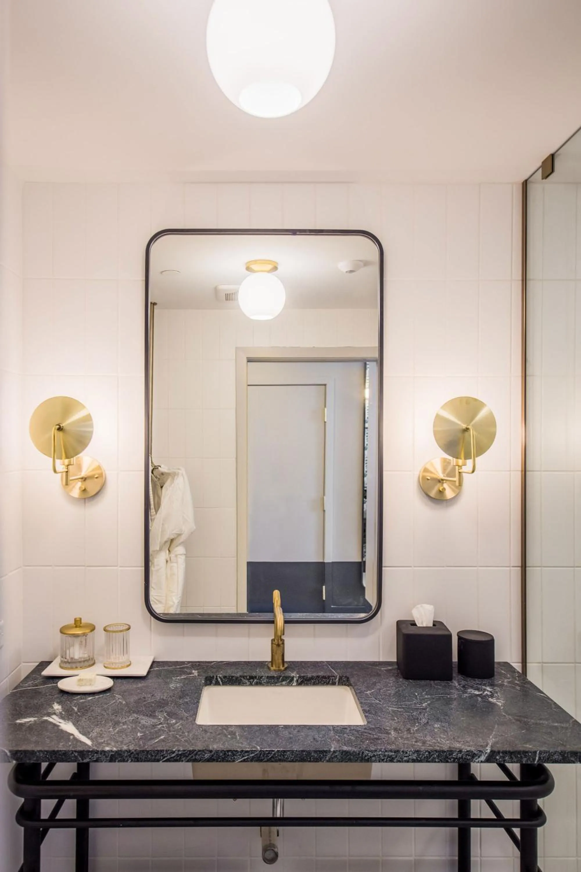 Bathroom in Woodlark Hotel Portland, a Tribute Portfolio Hotel