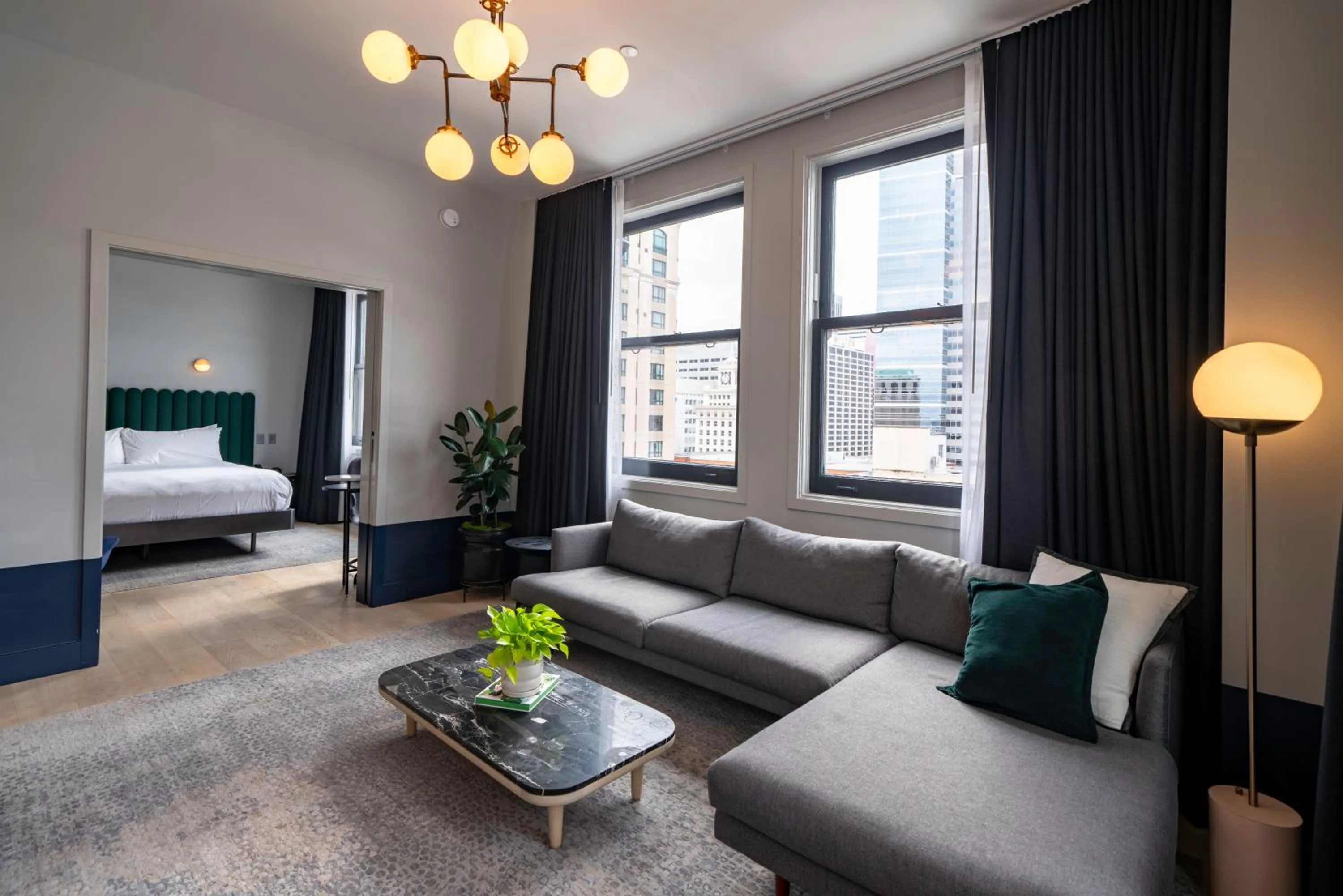 Living room, Bed in Woodlark Hotel Portland, a Tribute Portfolio Hotel