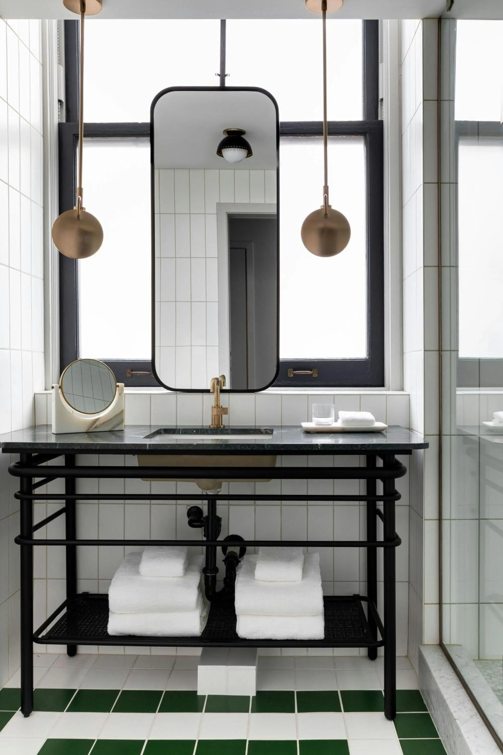 Bathroom in Woodlark Hotel Portland, a Tribute Portfolio Hotel