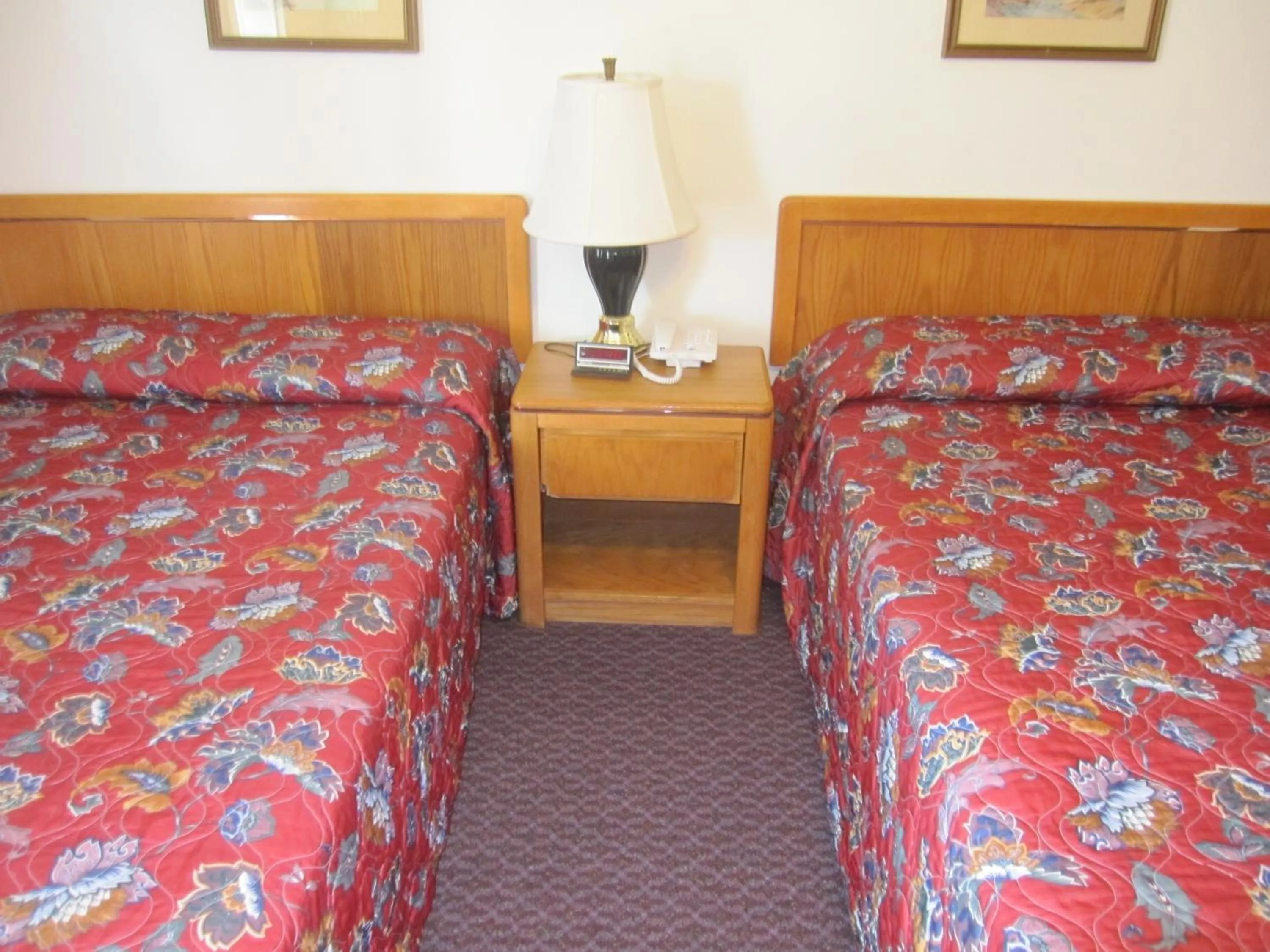 Bed in Pinecrest Motel