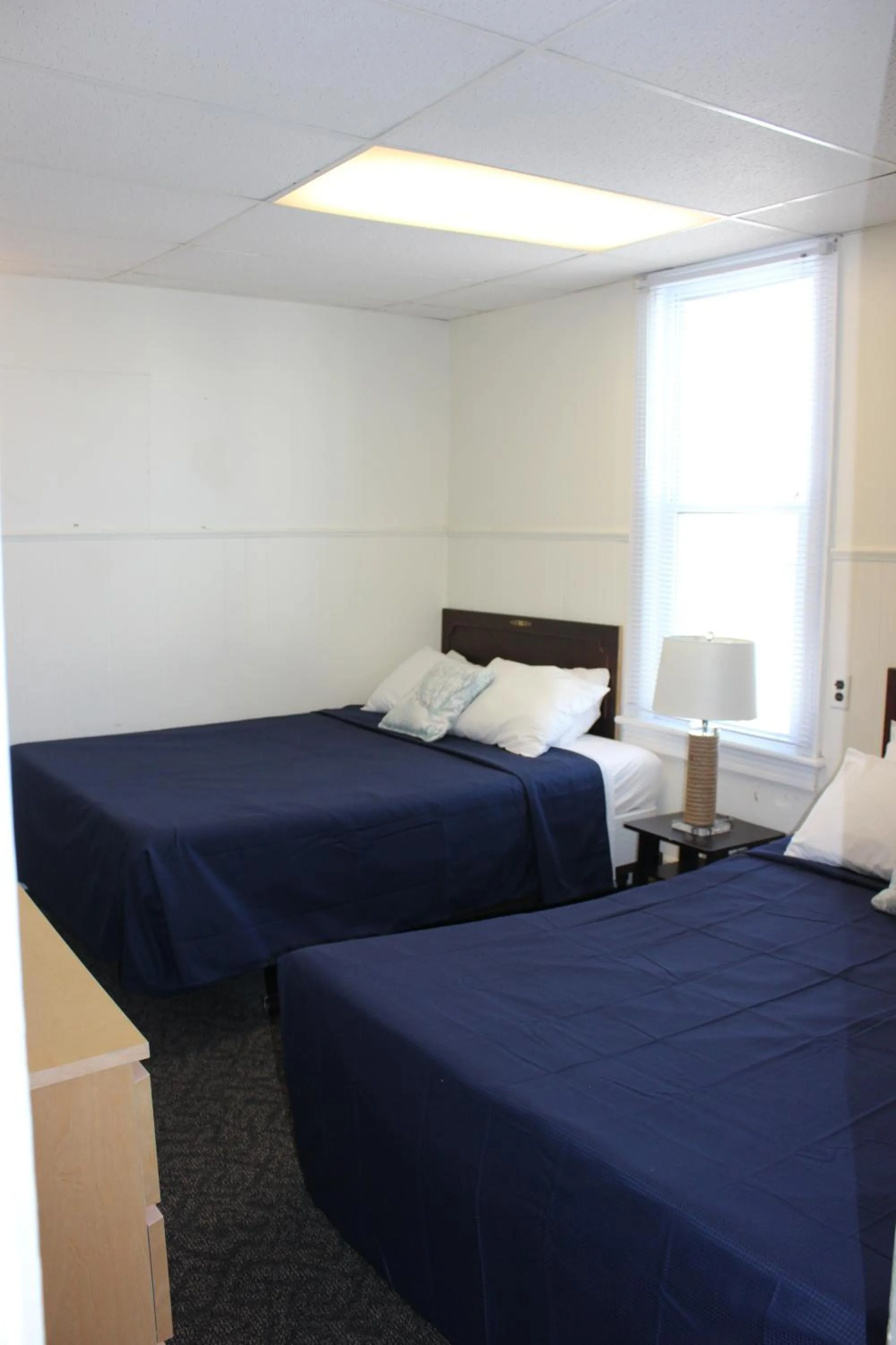 Bed in Blue Water Inn