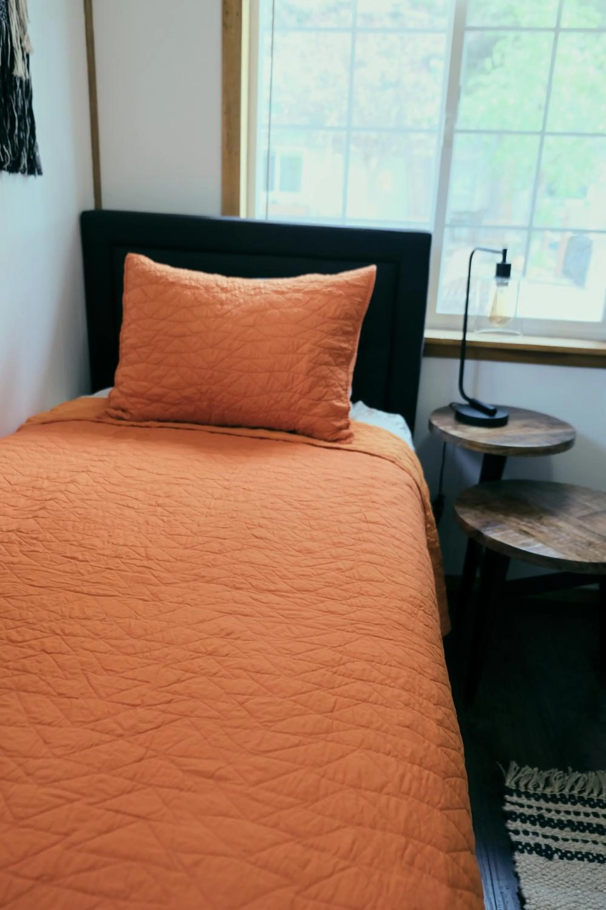 Bed in Lake Front Cabins