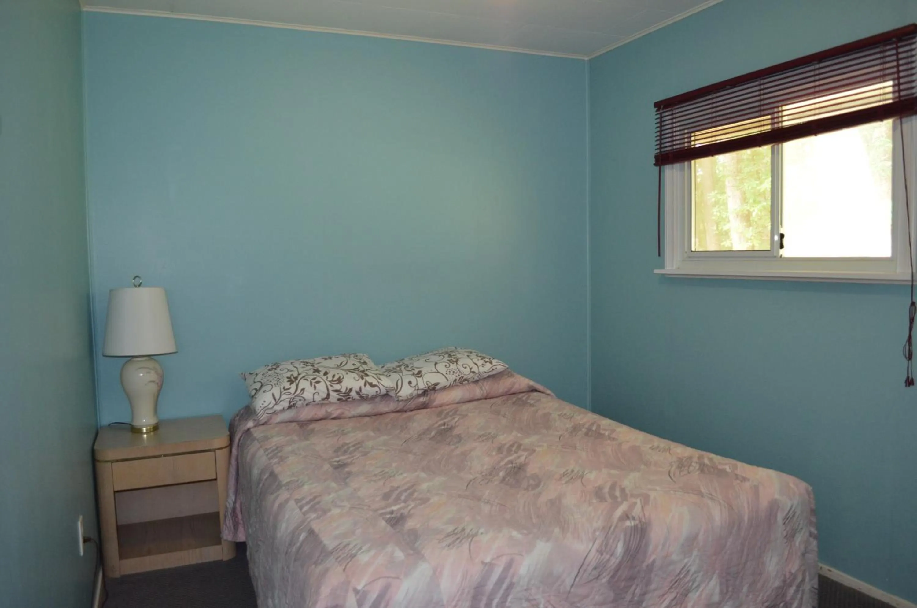 Bed in Seaside Villa Motel & RV Park