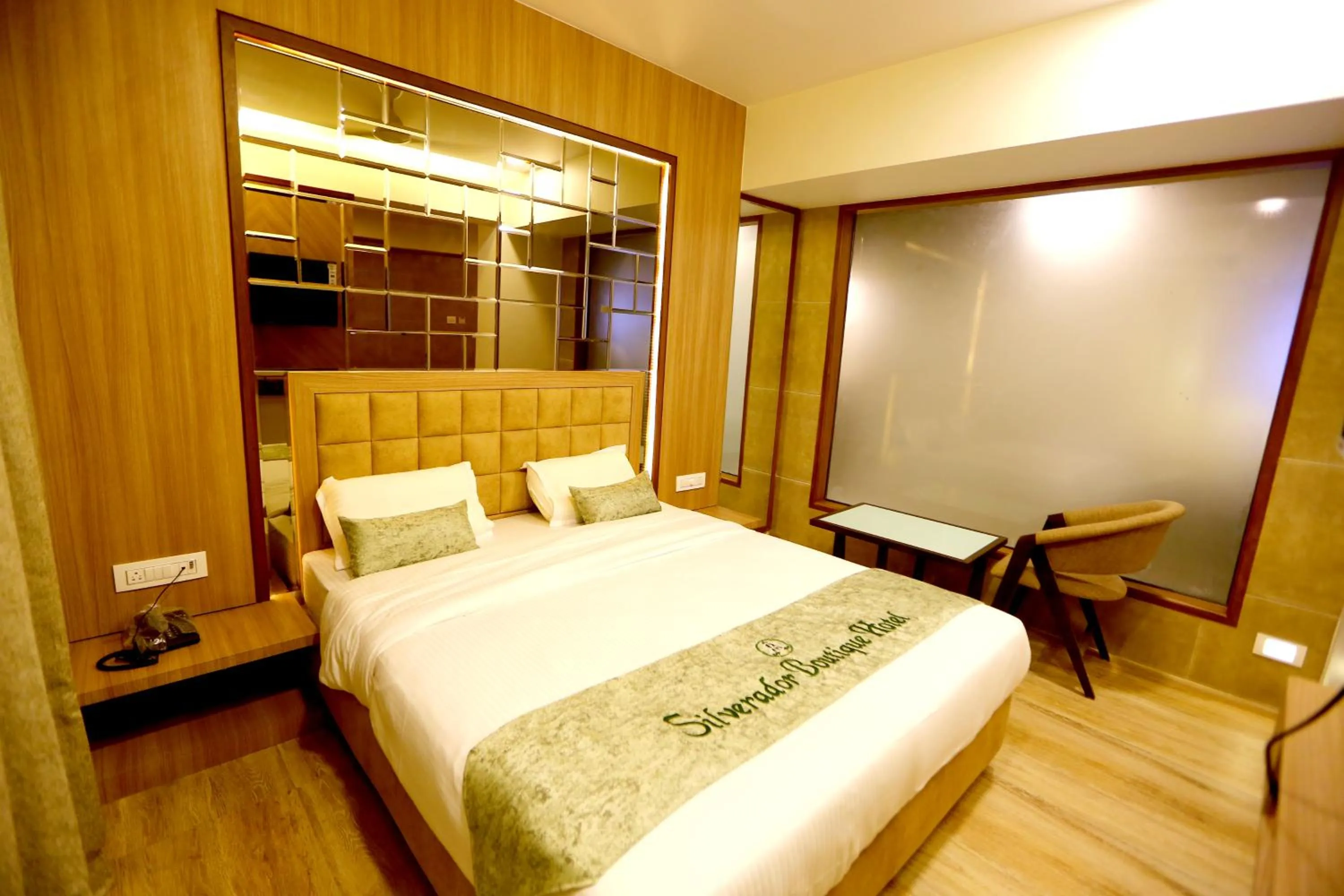 Bed in Silverador Boutique Hotel