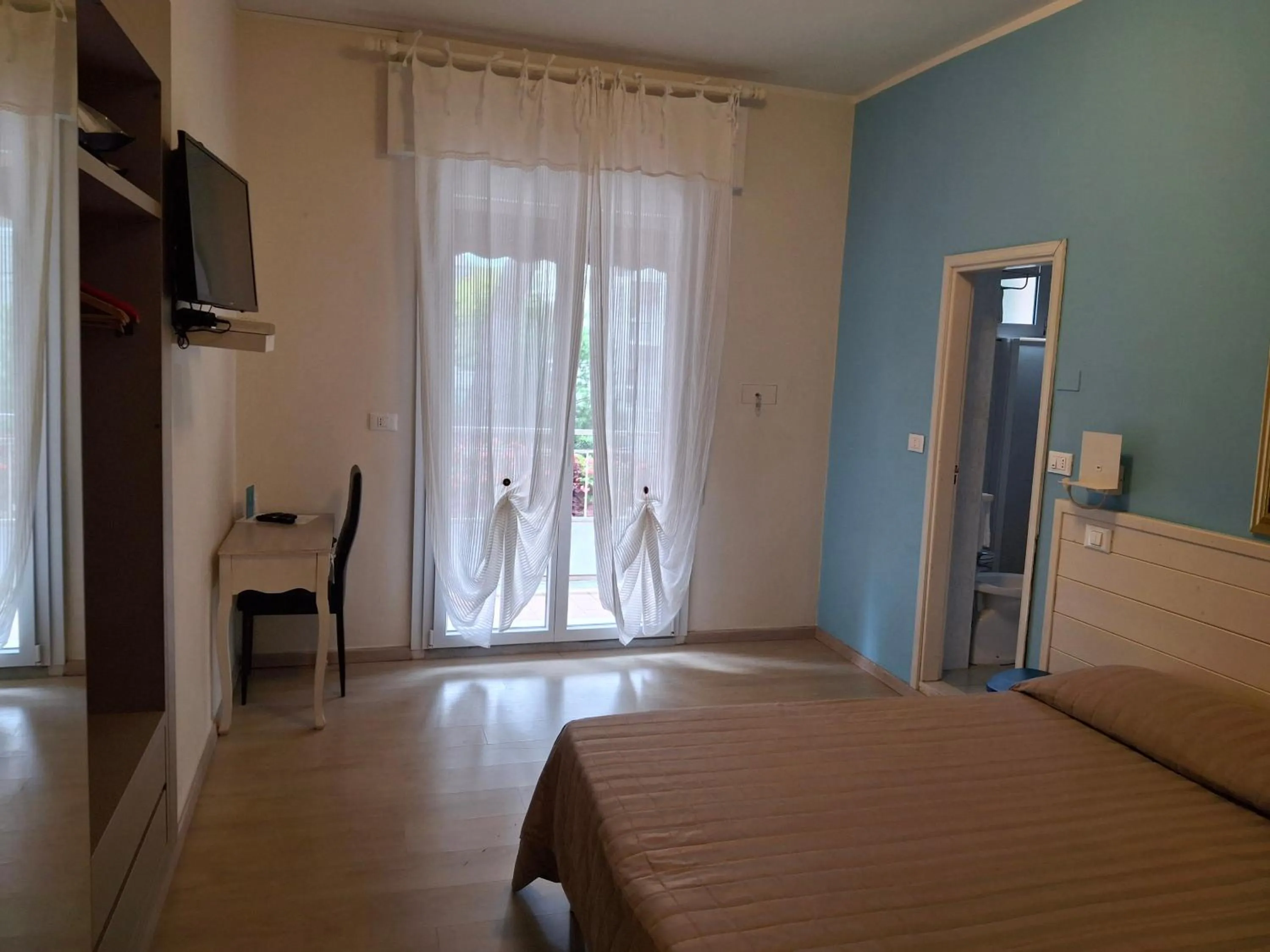 Bed in Hotel Santiago