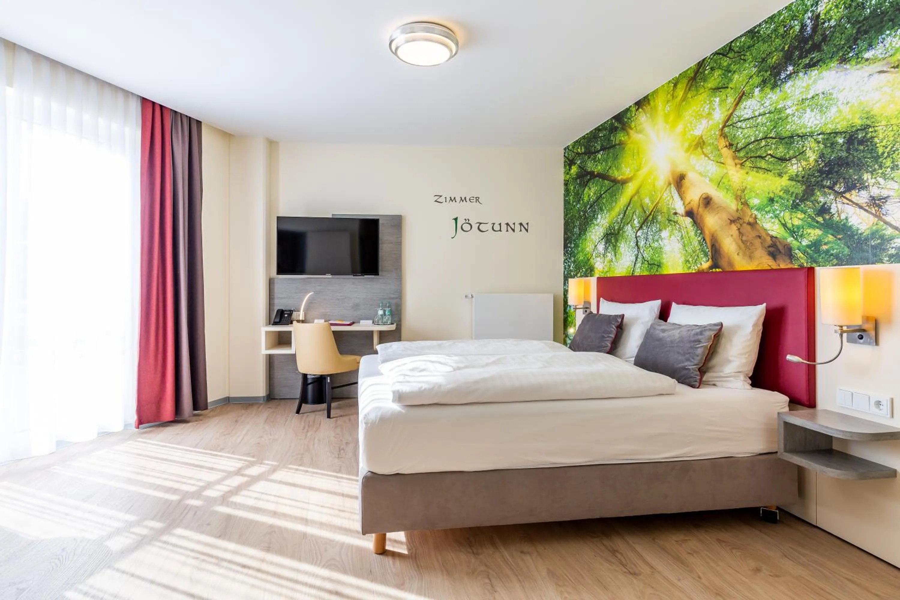 Photo of the whole room, Bed in Mythenresort Heimdall