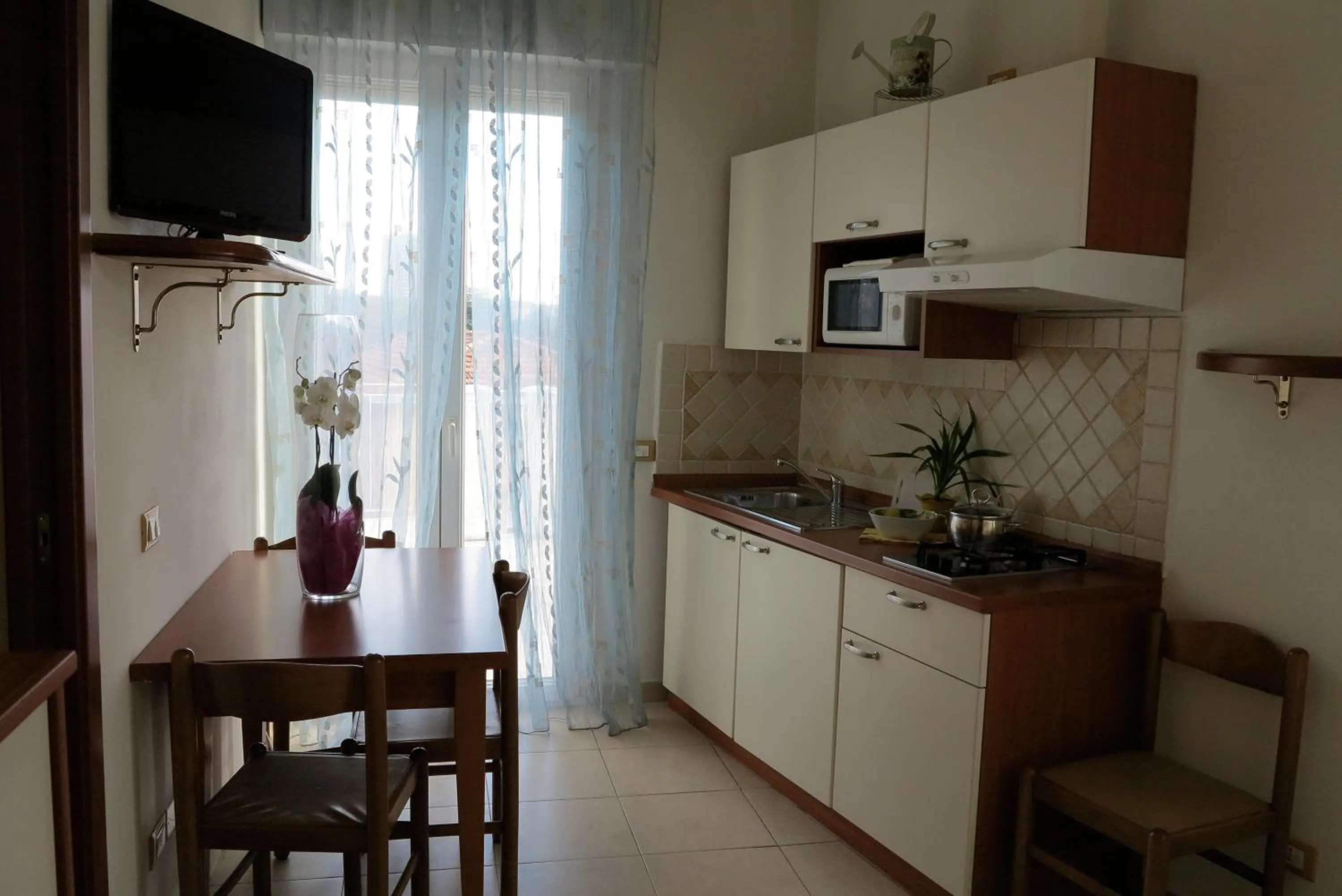 Dining area in Residence La Villetta