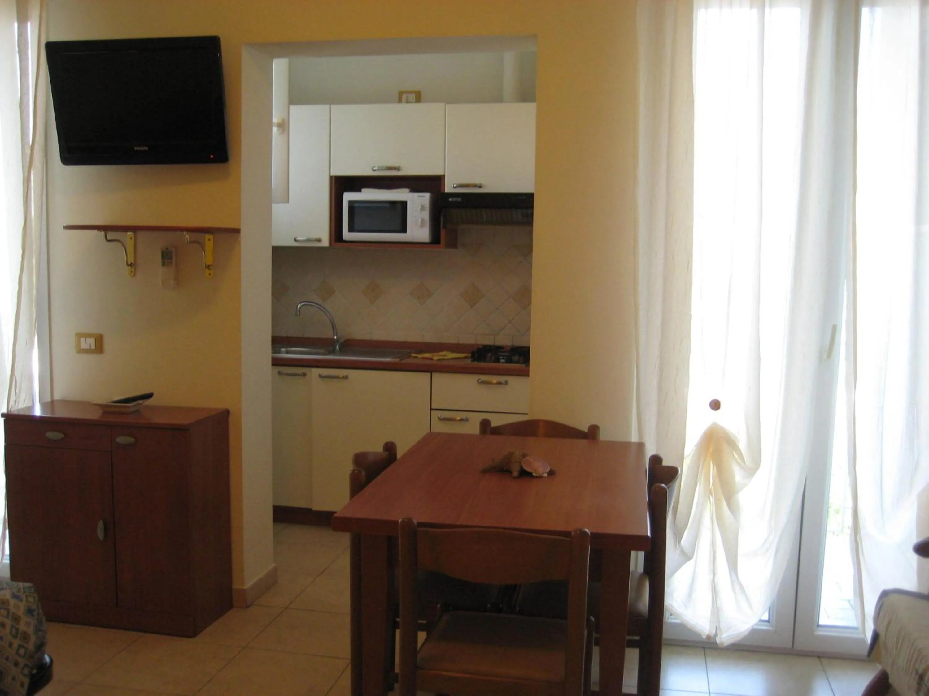 Kitchen or kitchenette in Residence La Villetta