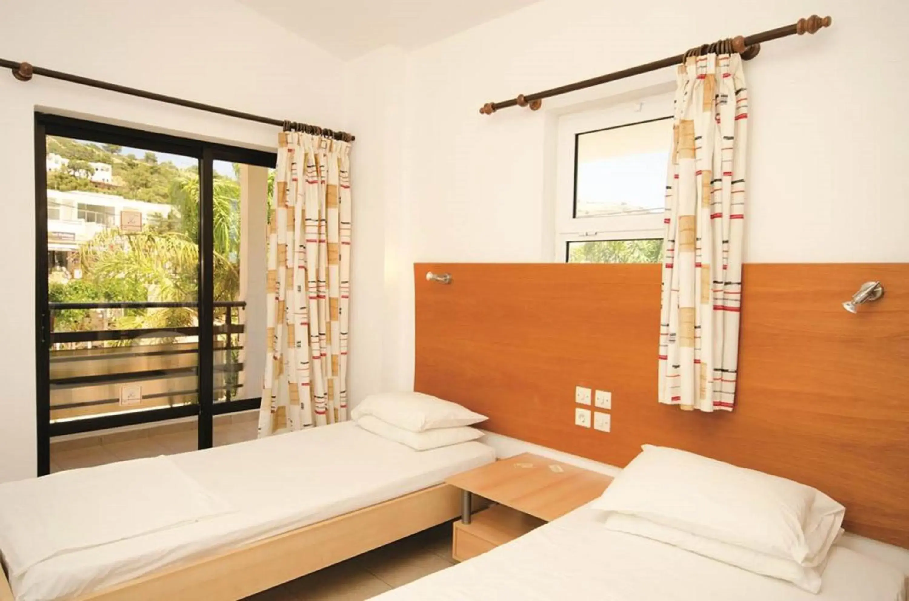 Bedroom, Bed in Coliseum Studios & Apartments Bedroom, Bed in Coliseum Studios & Apartments