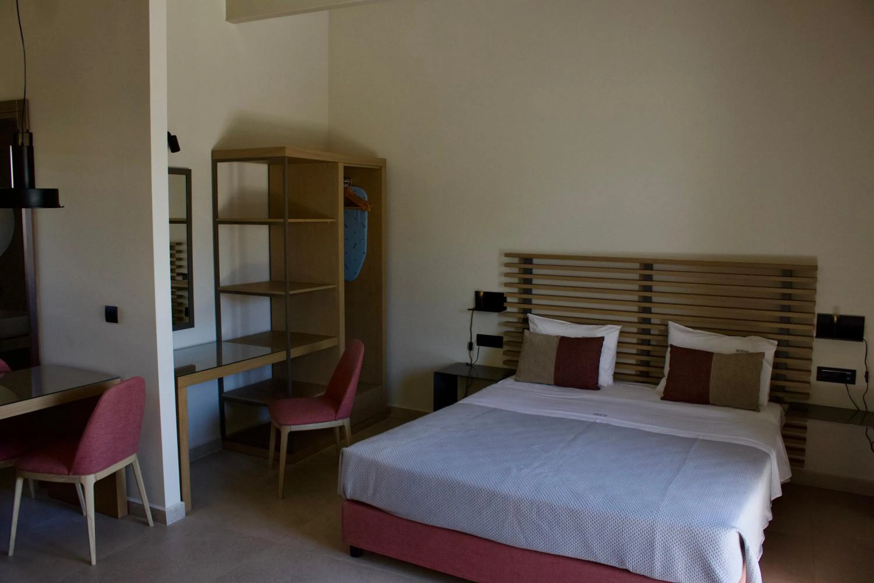 Photo of the whole room, Bed in Notos Luxury Studios