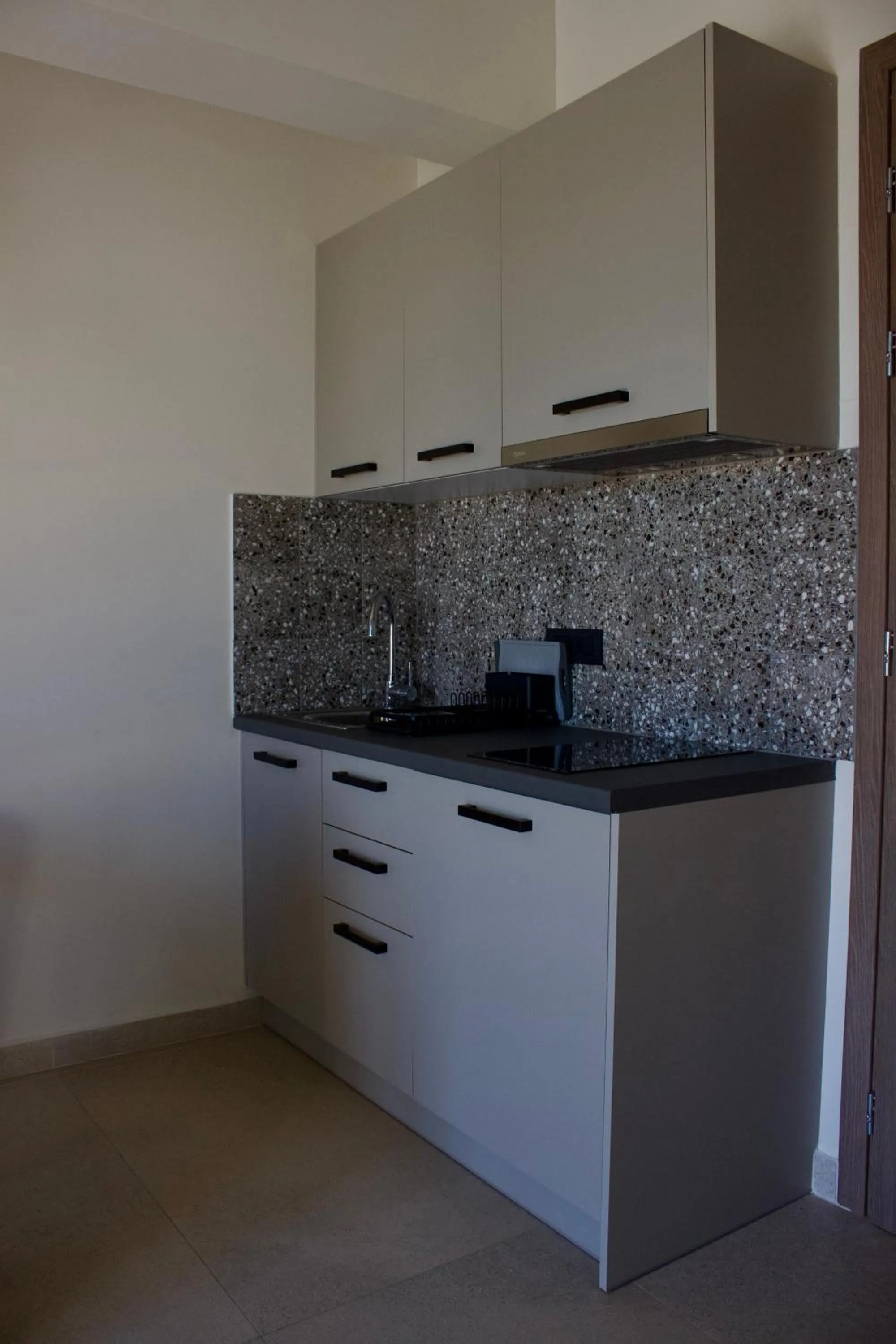 Kitchen or kitchenette in Notos Luxury Studios