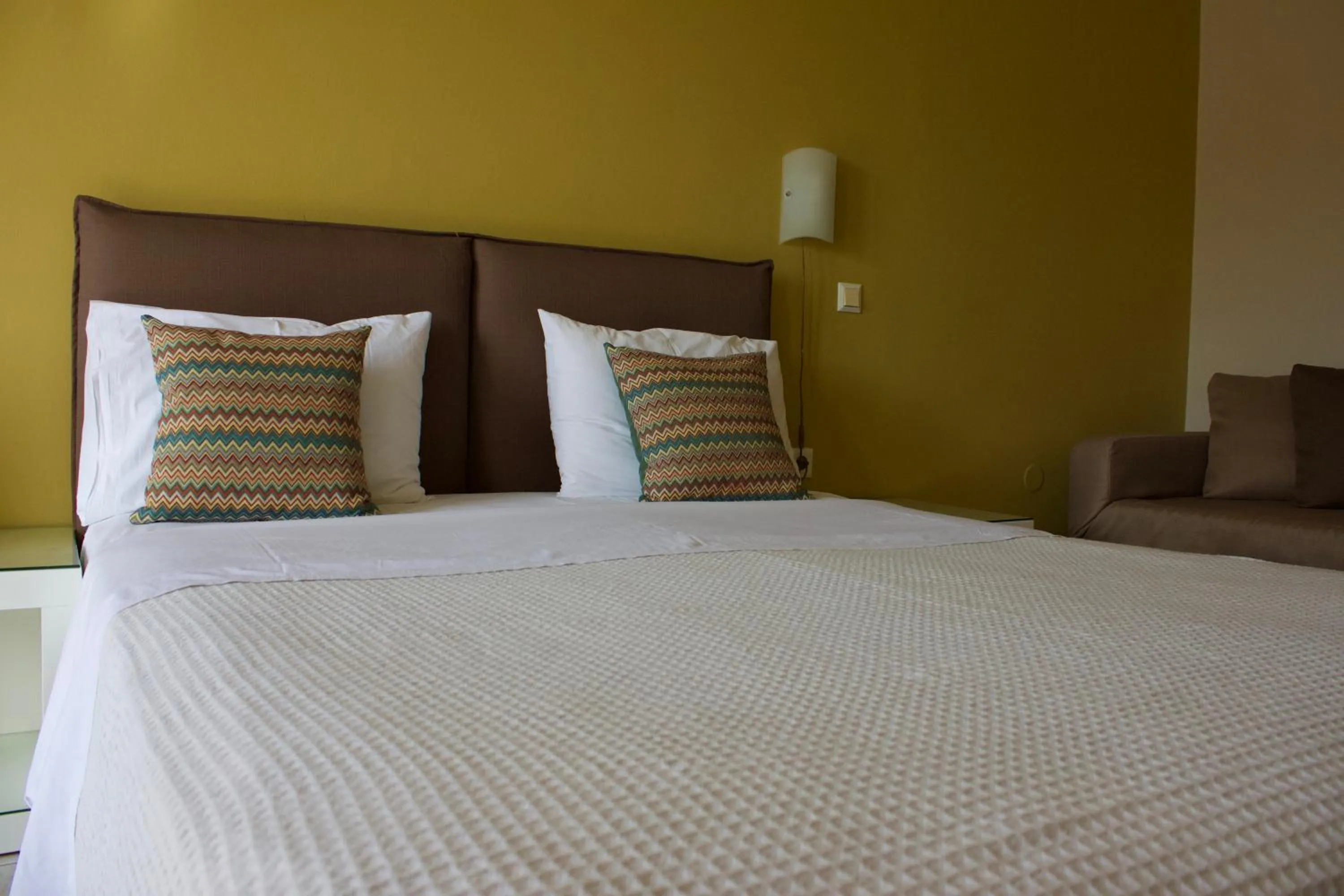 Bed in Notos Luxury Studios