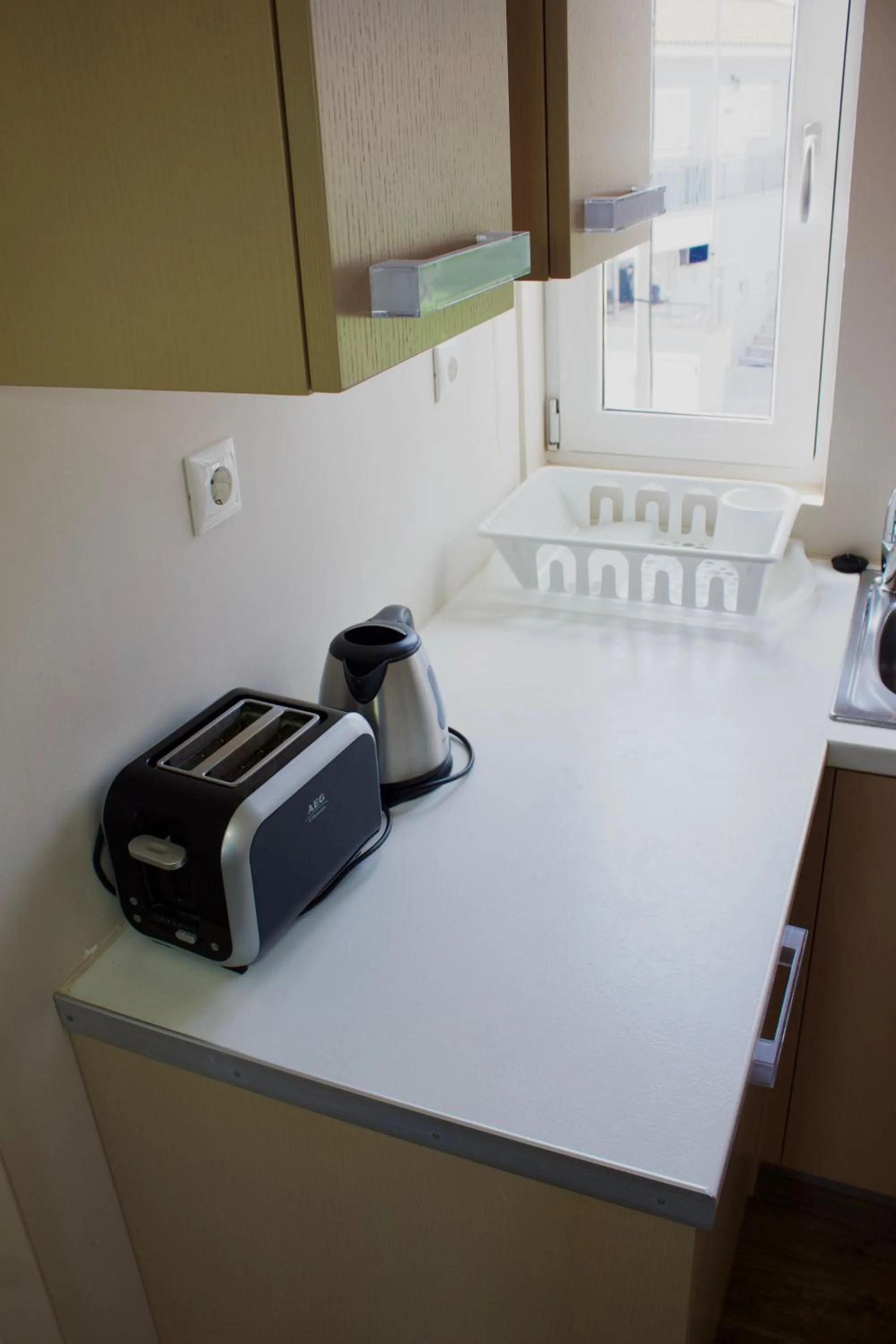 Kitchen or kitchenette in Notos Luxury Studios