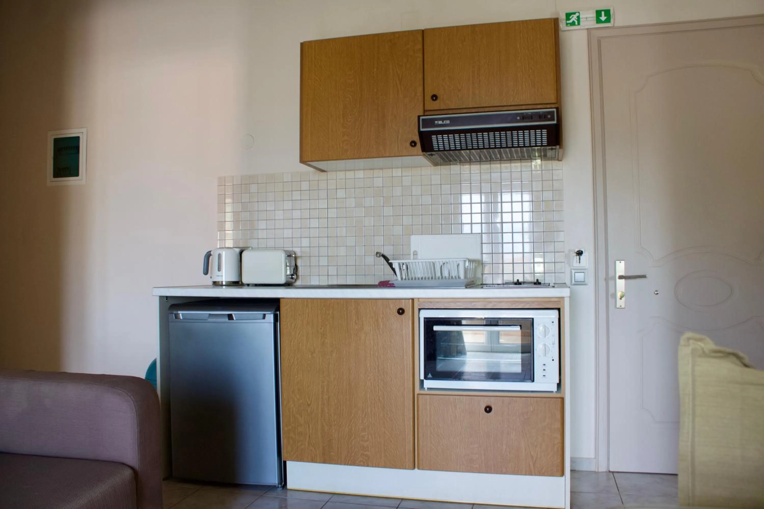 Kitchen or kitchenette in Notos Luxury Studios