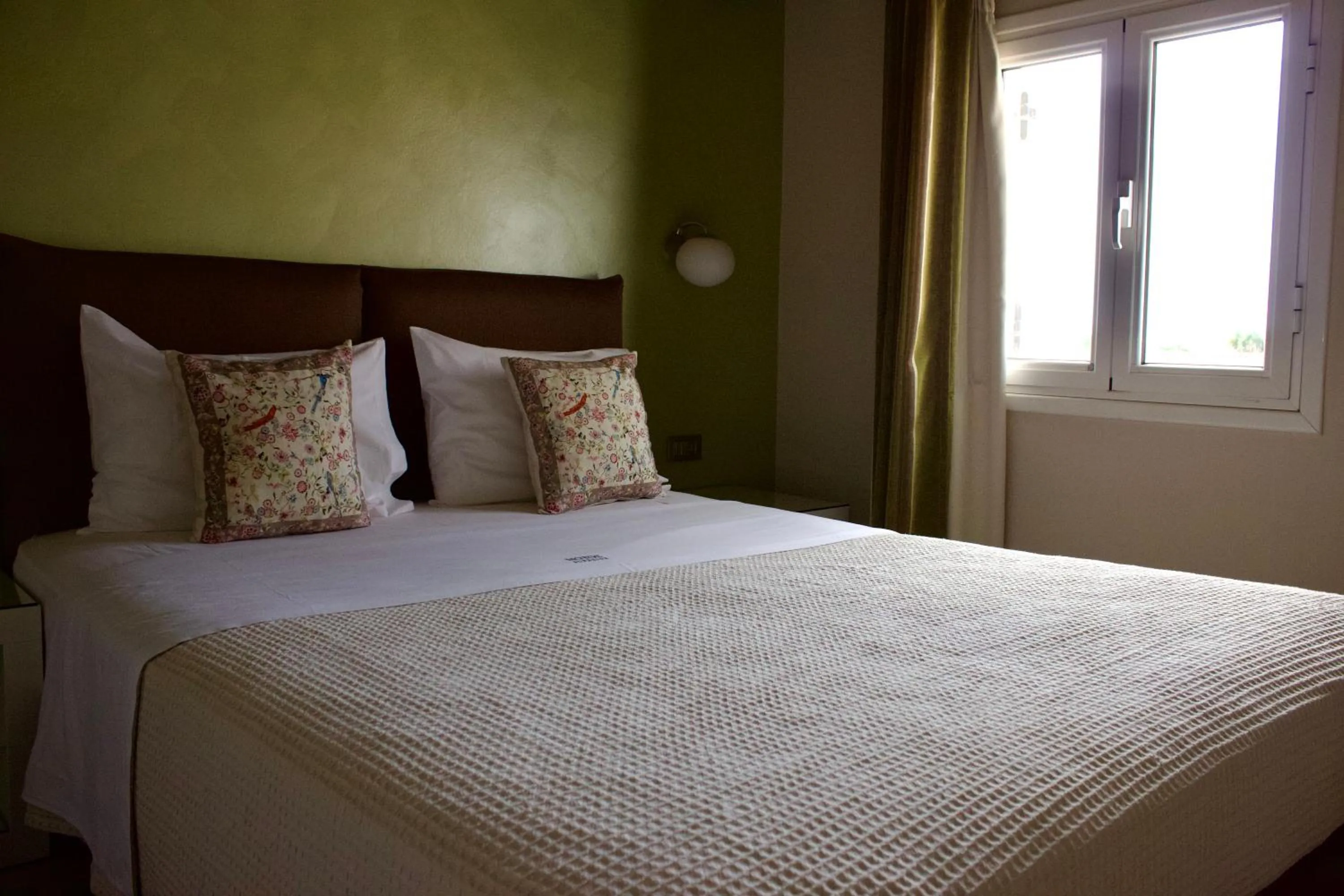 Bed in Notos Luxury Studios