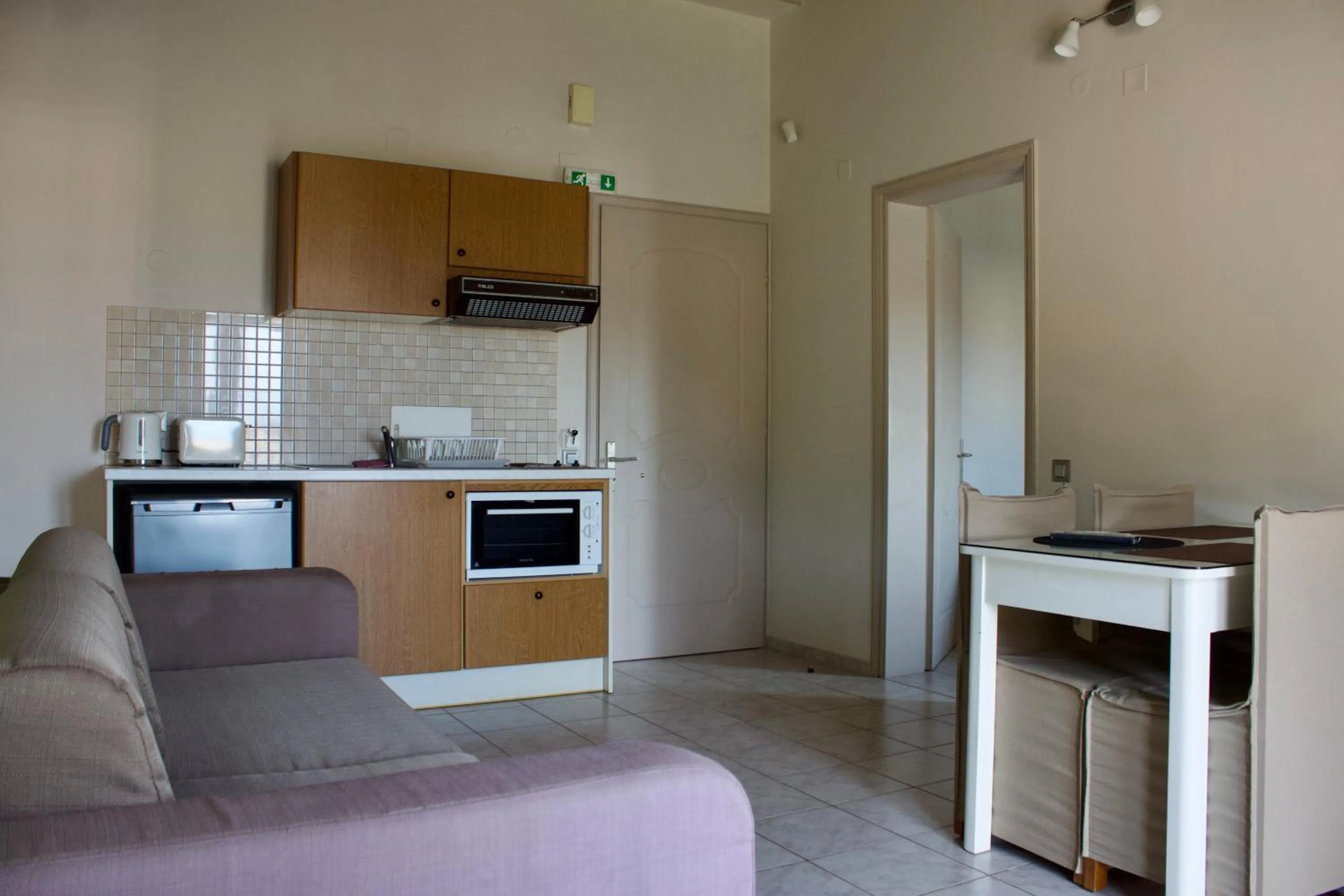 Kitchen or kitchenette in Notos Luxury Studios