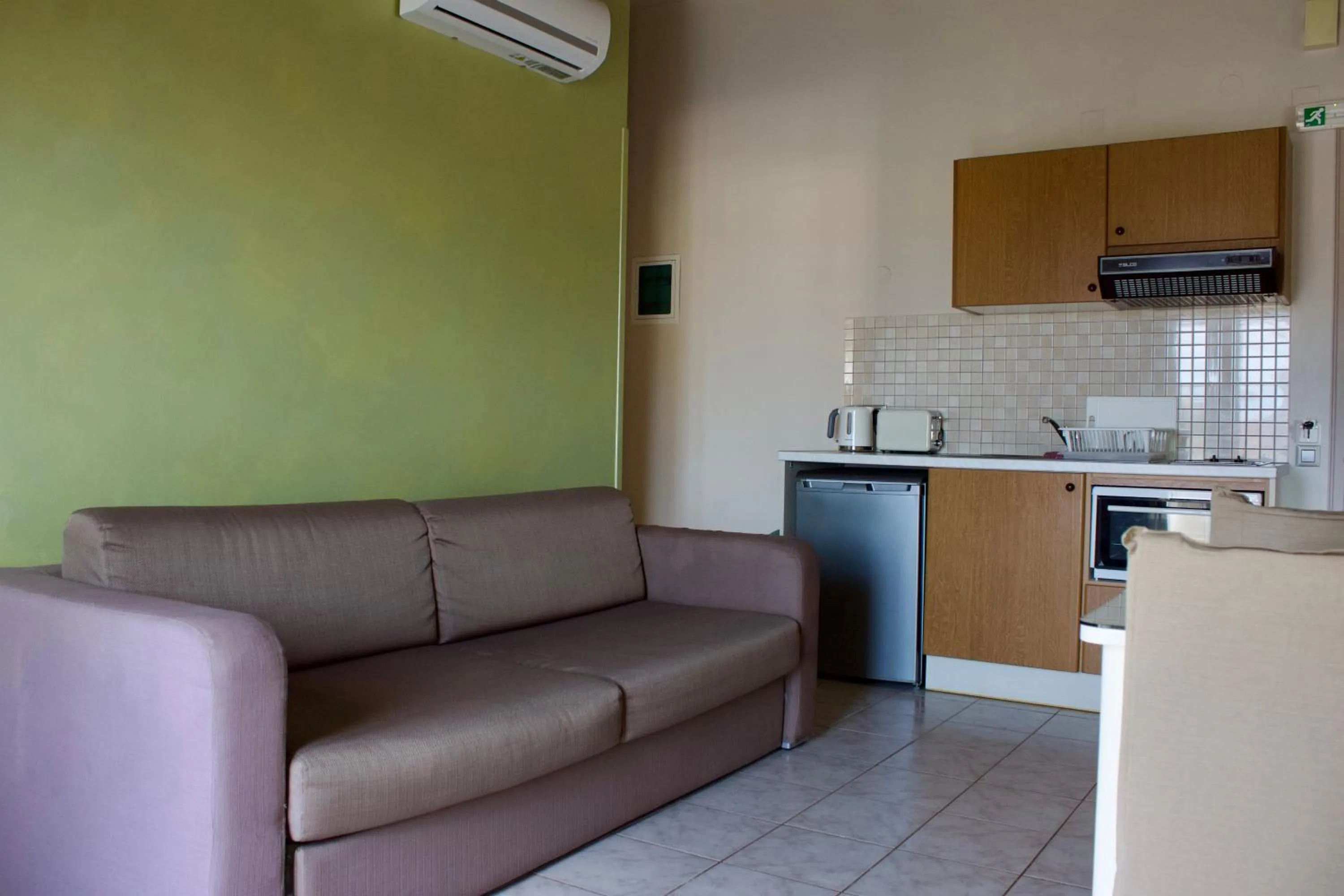 Kitchen or kitchenette in Notos Luxury Studios