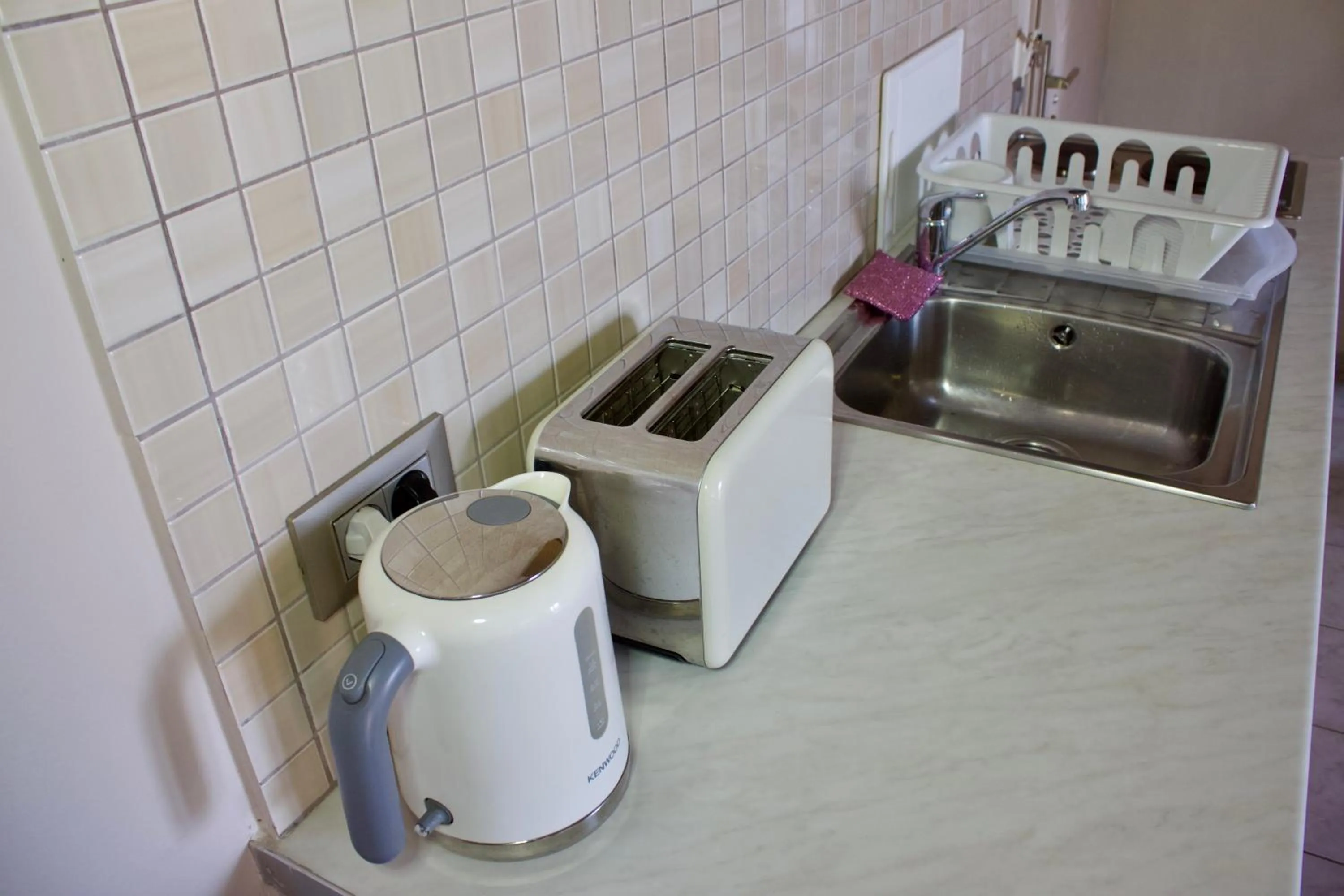 Kitchen or kitchenette in Notos Luxury Studios