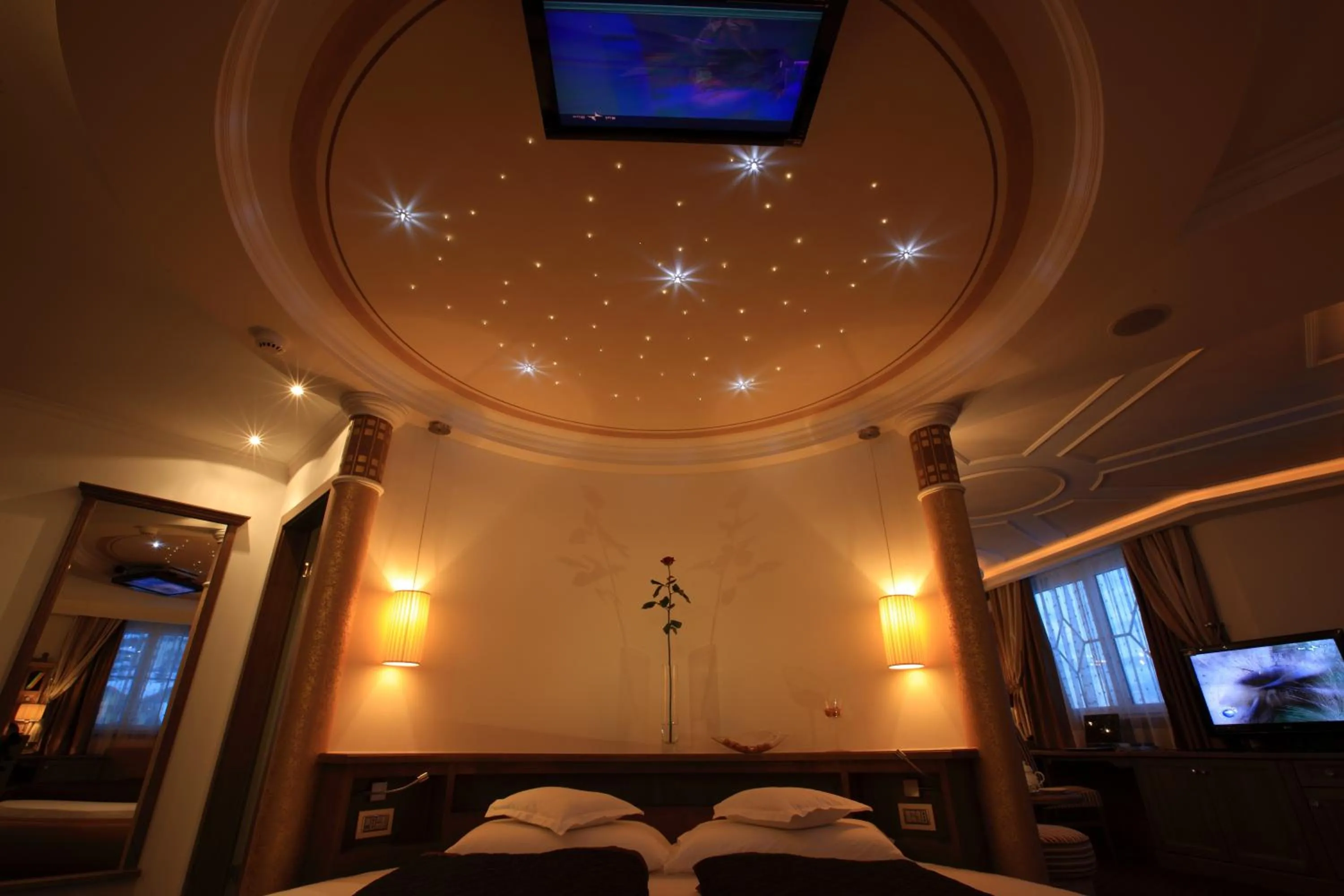 Bed in Dolce Avita Hotel Spa & Resort