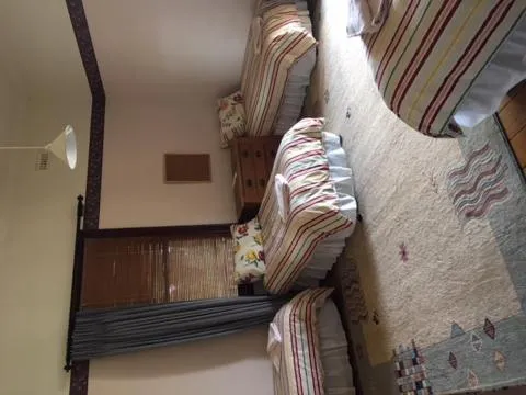 Bed in Holmhurst Guest House