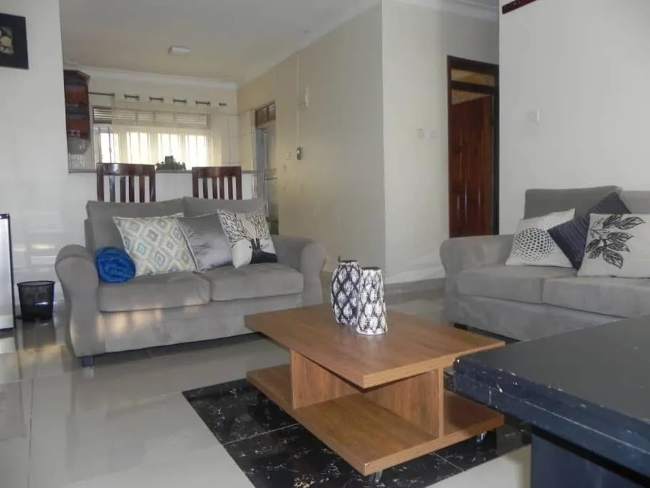 Seating area, Bed in MAMIKKI Hotel Apartments